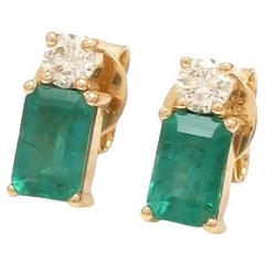 Natural zambian emerald diamond studs in 14k gold