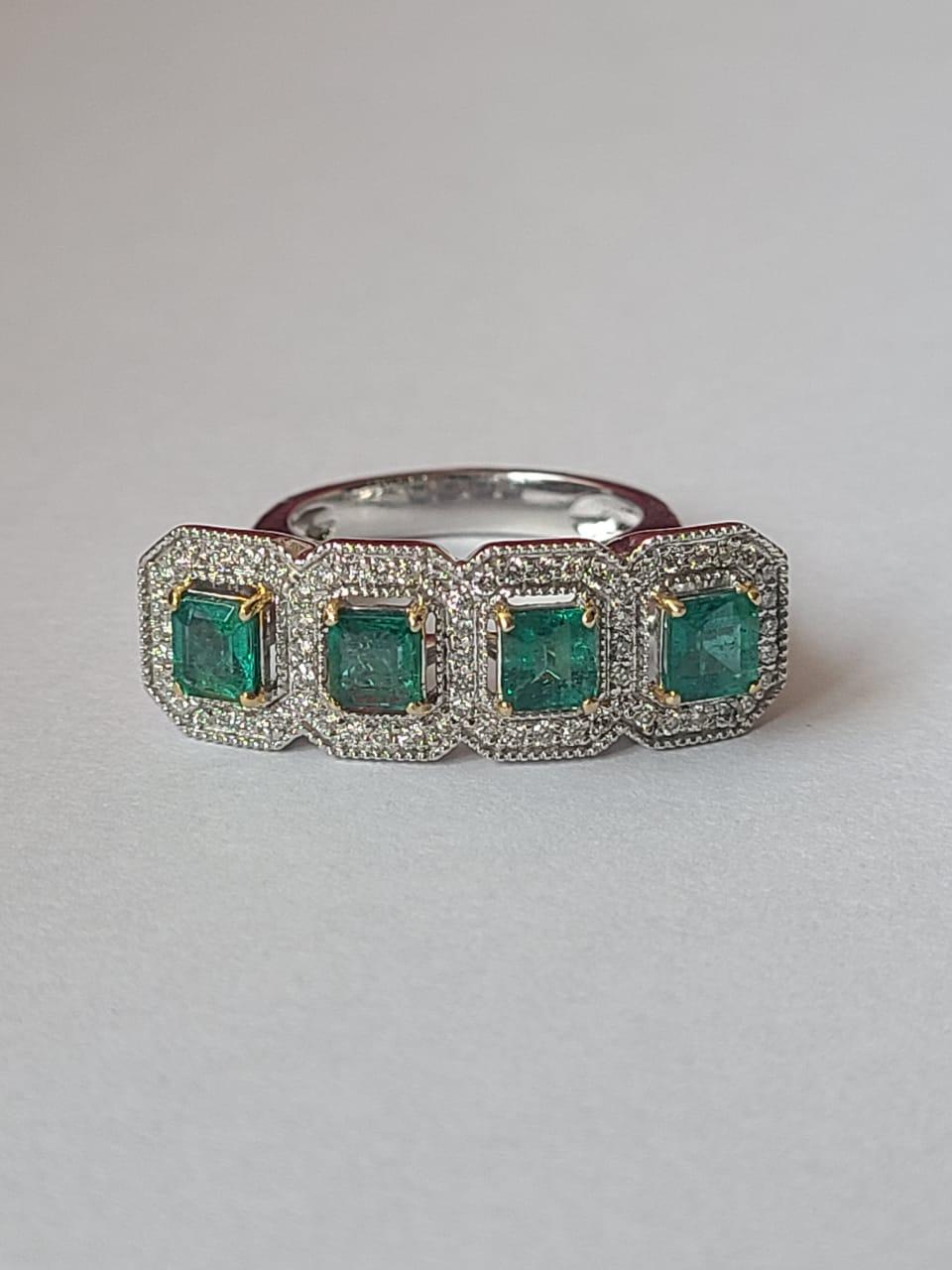 A very beautiful and one of a kind, Emerald Cocktail Ring set in 18K White Gold & Diamonds. The weight of the Emerald Squares is 1.56 carats. The weight of the Diamonds is 0.45 carats. Net Gold weight is 10.73 grams. The dimensions of the ring are