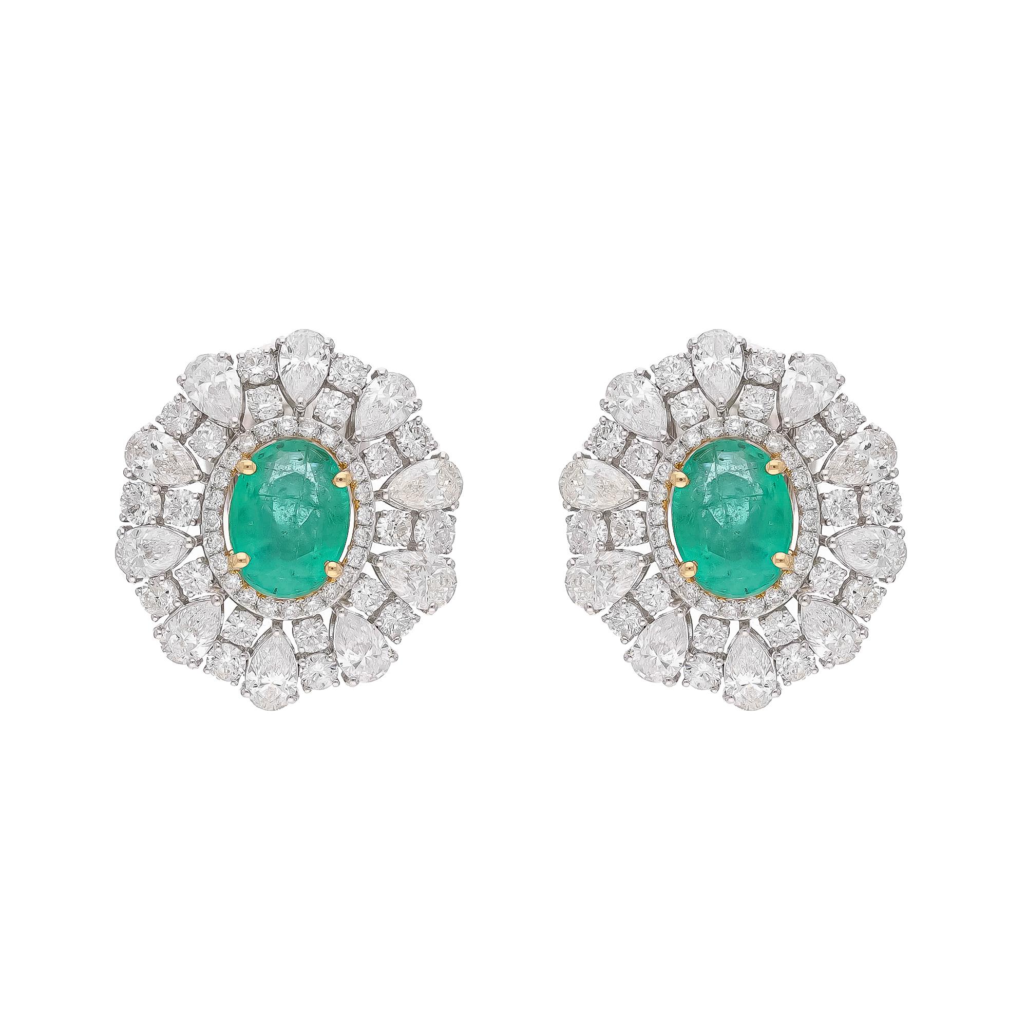 This is a natural Zambian Emerald earring with diamonds and 18k gold. The emeralds are very high quality and very good quality diamonds the clarity is vsi and G colour


Emeralds : 3.42 carats
diamonds : 5.49 carats
gold : 9.488 gms

This is a Brand