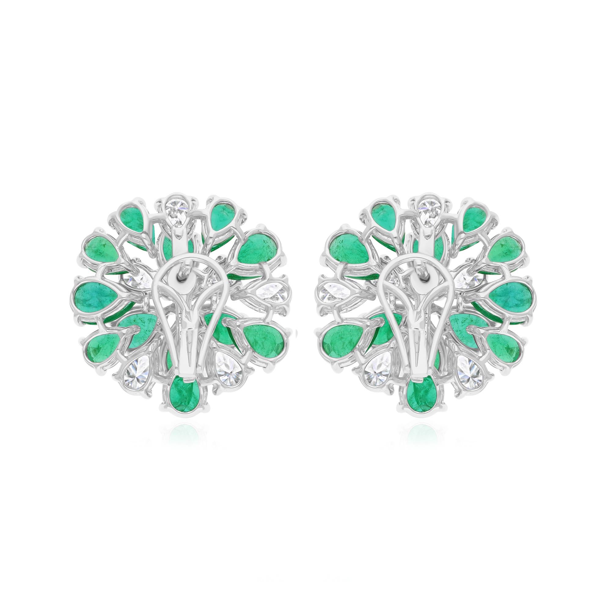 Cast from 14-karat gold, these exquisite earrings are handset with 13.29 carats Zambian emerald and 4.25 carats of sparkling diamonds.

FOLLOW SPECTRUM JEWELS storefront to view the latest collection & exclusive pieces. Spectrum Jewels is proudly