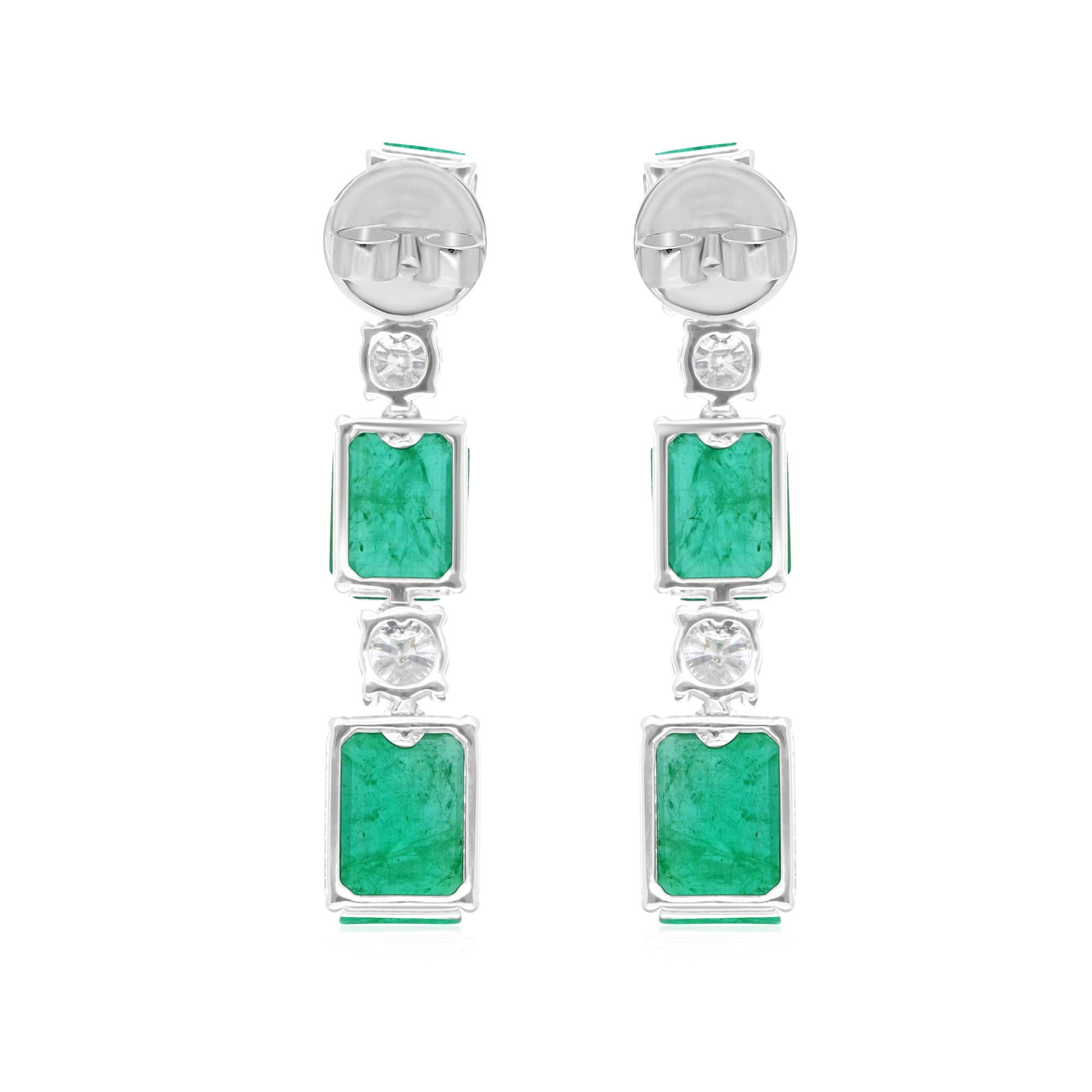 Cast from 14-karat gold, these exquisite earrings are handset with 9.85 carats Zambian emerald and 0.93 carats of sparkling diamonds.

FOLLOW SPECTRUM JEWELS storefront to view the latest collection & exclusive pieces. Spectrum Jewels is proudly