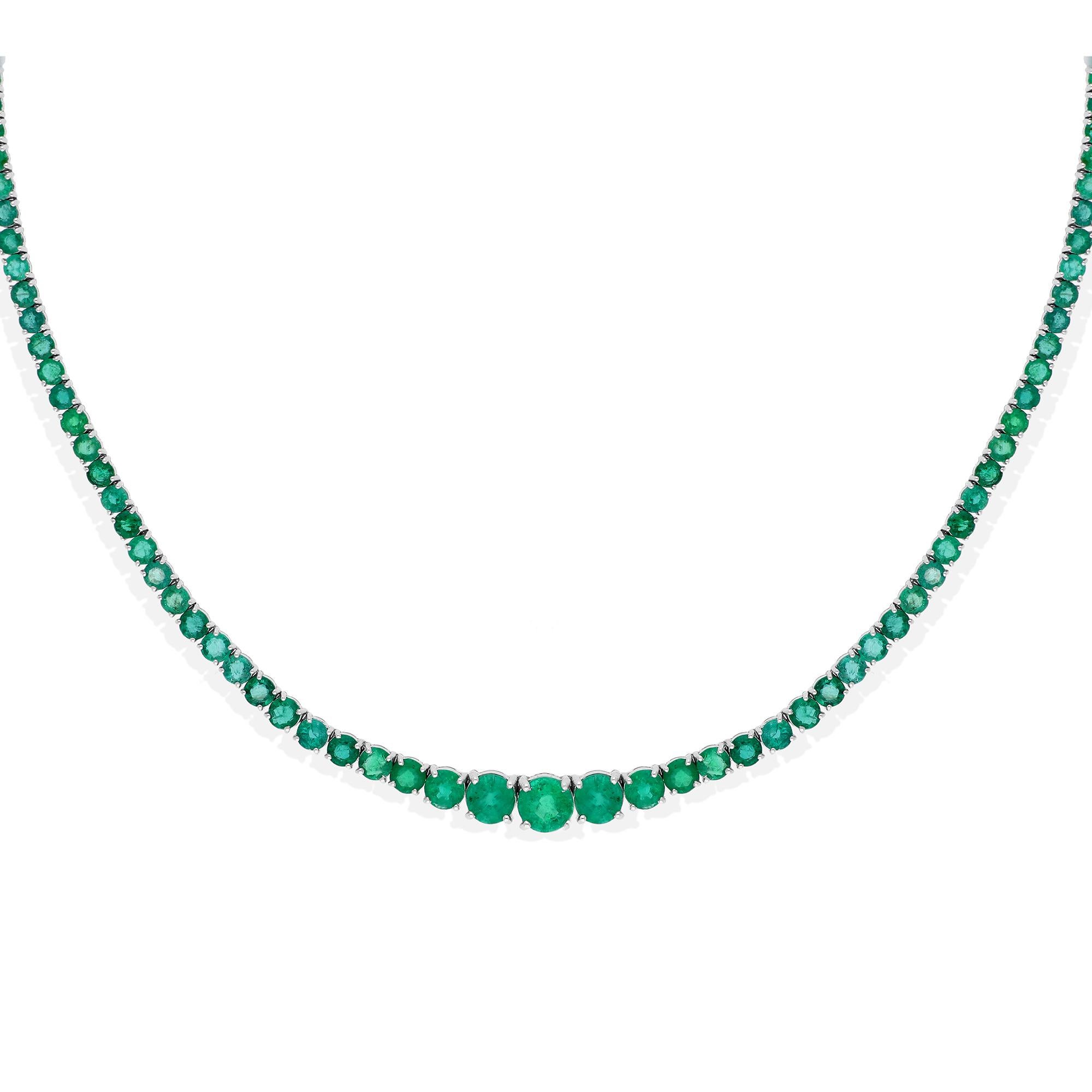 Each Zambian emerald, carefully selected for its exceptional quality and mesmerizing hue, is expertly graduated in size, creating a breathtaking cascade of green brilliance. The rich, verdant tones of the emeralds evoke a sense of natural beauty and