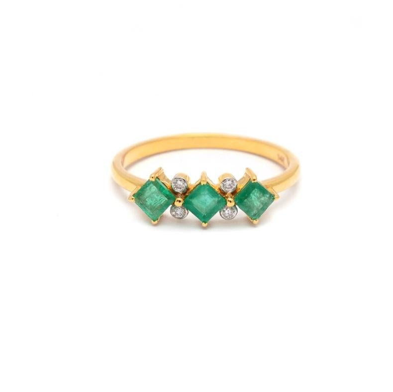 This regal ring made with 14K solid yellow gold and bejeweled with natural diamond and emerald gemstones is the ideal present for your lady love. Powerfully delicate in its own right, the ring symbolizes growth and harmony because of its enchanting
