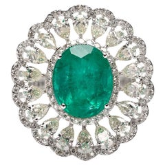 natural Zambian emerald ring with 6.30 Cts and 3.11 CTs diamond pears in 14k 