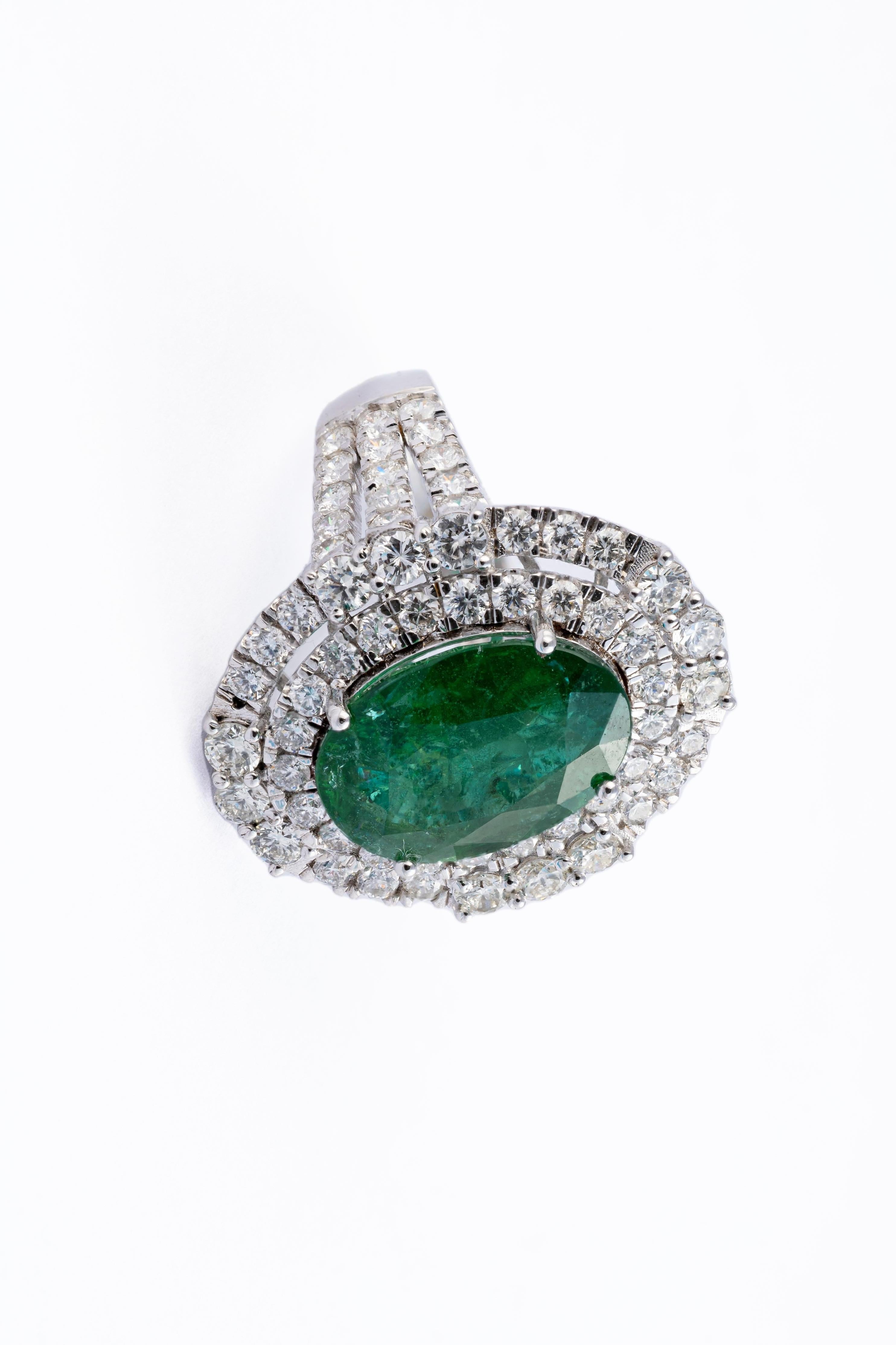 dies ist ein atemberaubender natürlicher sambischer Smaragd  ring mit sehr hochwertigem Smaragd und Diamanten von sehr guter Qualität ( vsi ) und Farbe G

smaragde : 5.97cts
diamanten: 2,74cts
gold :7.048gms
