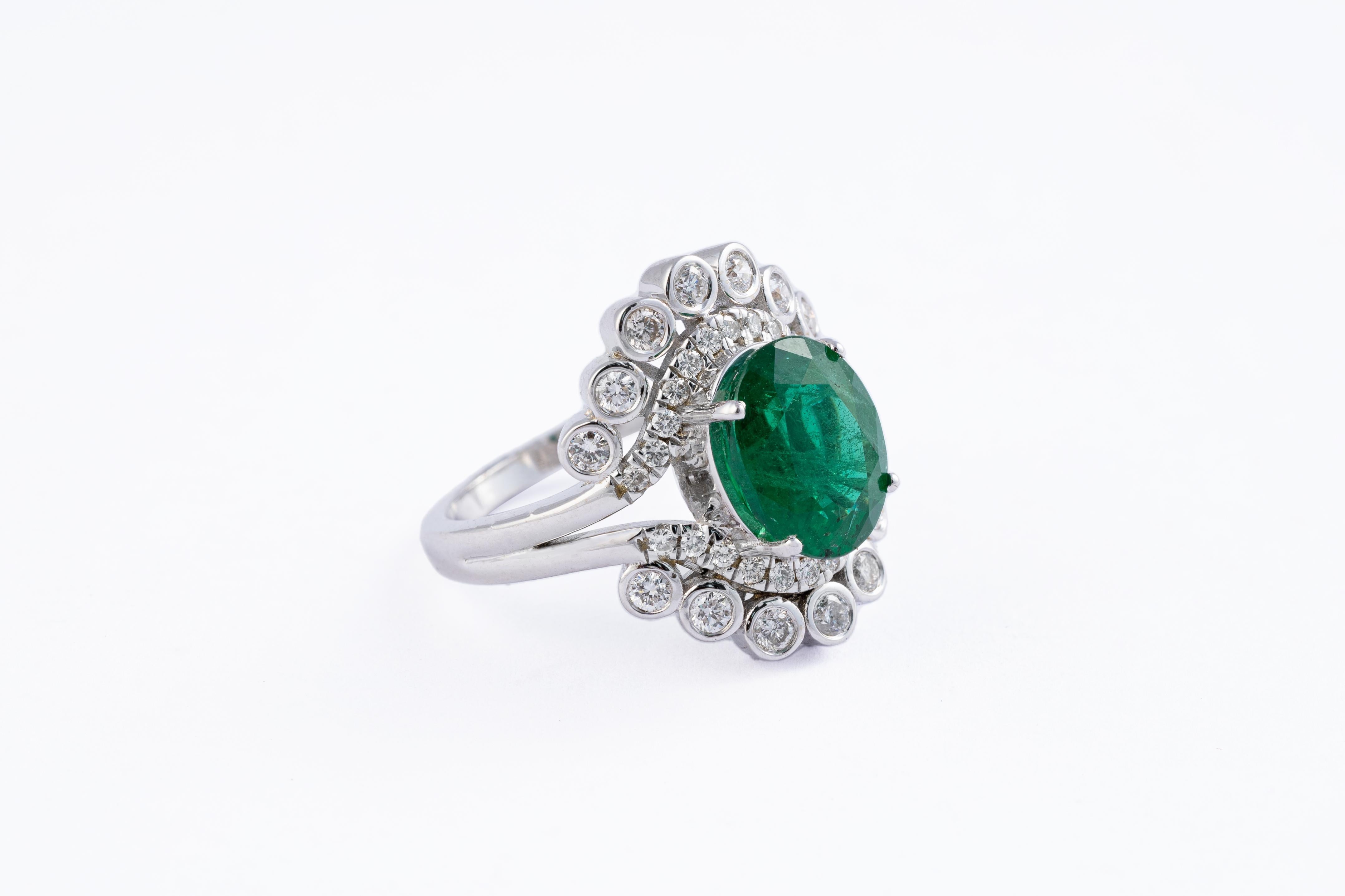 This is an amazing everyday wear ring with high quality Zambian natural emerald and very good clarity diamonds which are vsi in clarity and G colour

emeralds: 2.96 cts
diamonds : 0.65 cts
gold : 5.88 gms