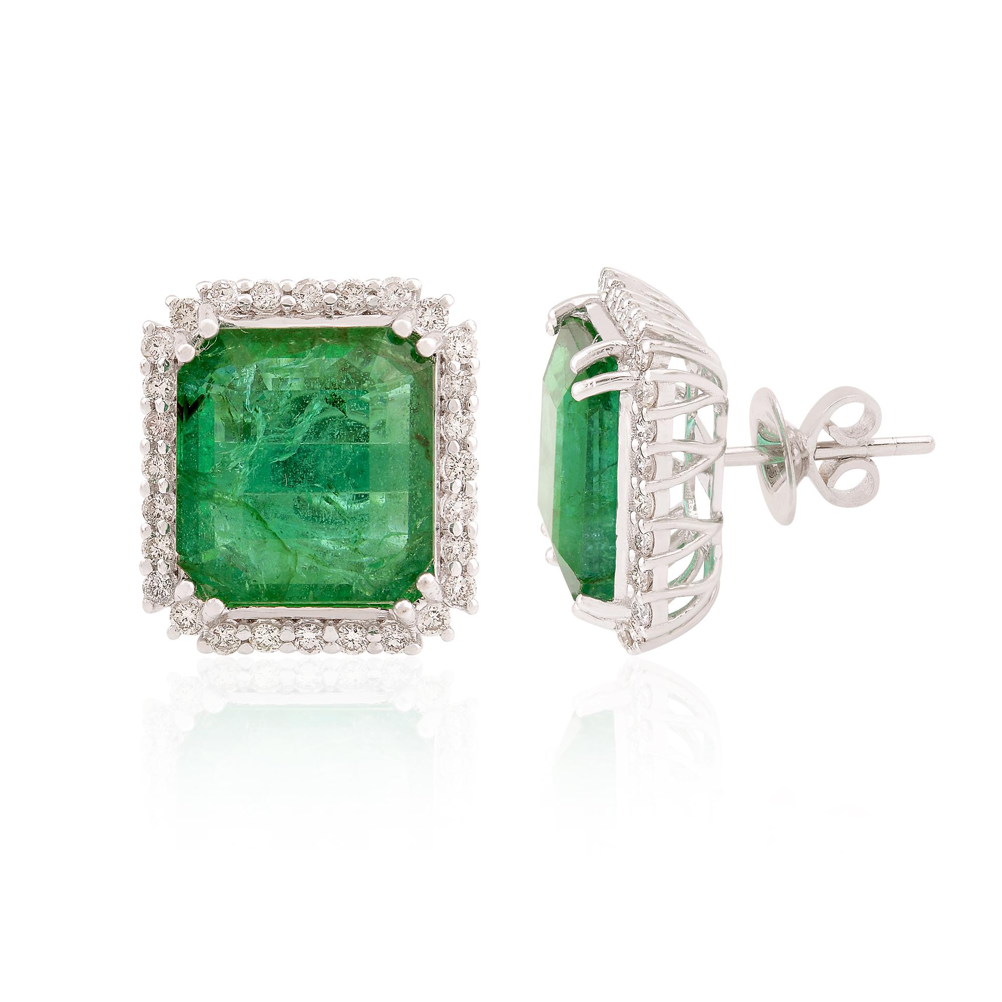 Each earring boasts a captivating Zambian Emerald, sourced from the rich mines of Zambia, renowned for producing some of the world's most sought-after emeralds. The lush green hue of these emeralds reflects the verdant landscapes from which they are