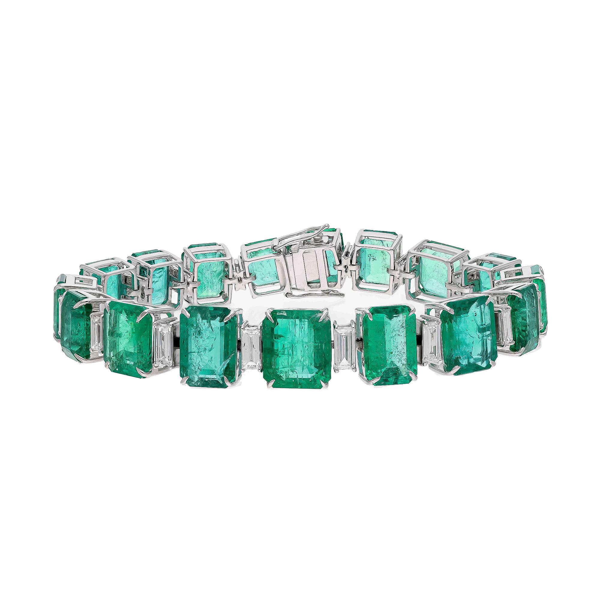 This is a wonderful natural Zambian Emerald tennis bracelet. it has very high quality emeralds and very good quality diamonds ( vsi ) clarity and G Colour .

such quality of octagon layout with this super quality and colour is very rare to