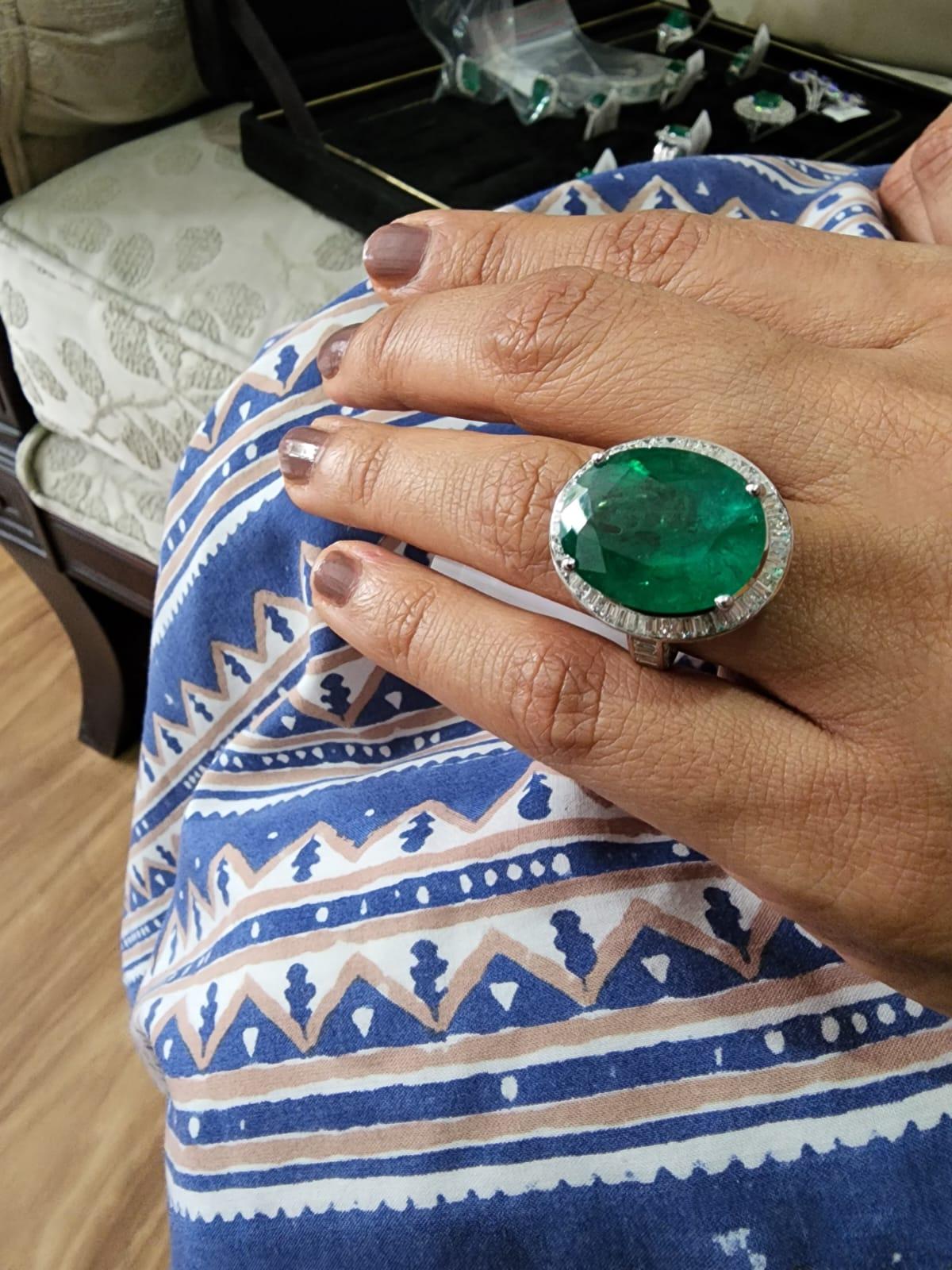 This is a natural Zambian Emerald ring with 14.90 carats emerald and 2.15 cents diamonds and 6.60 gms . The emeralds are very high quality and very good quality diamonds the clarity is vsi and G colour

 This is a brand new piece 


. Its very hard
