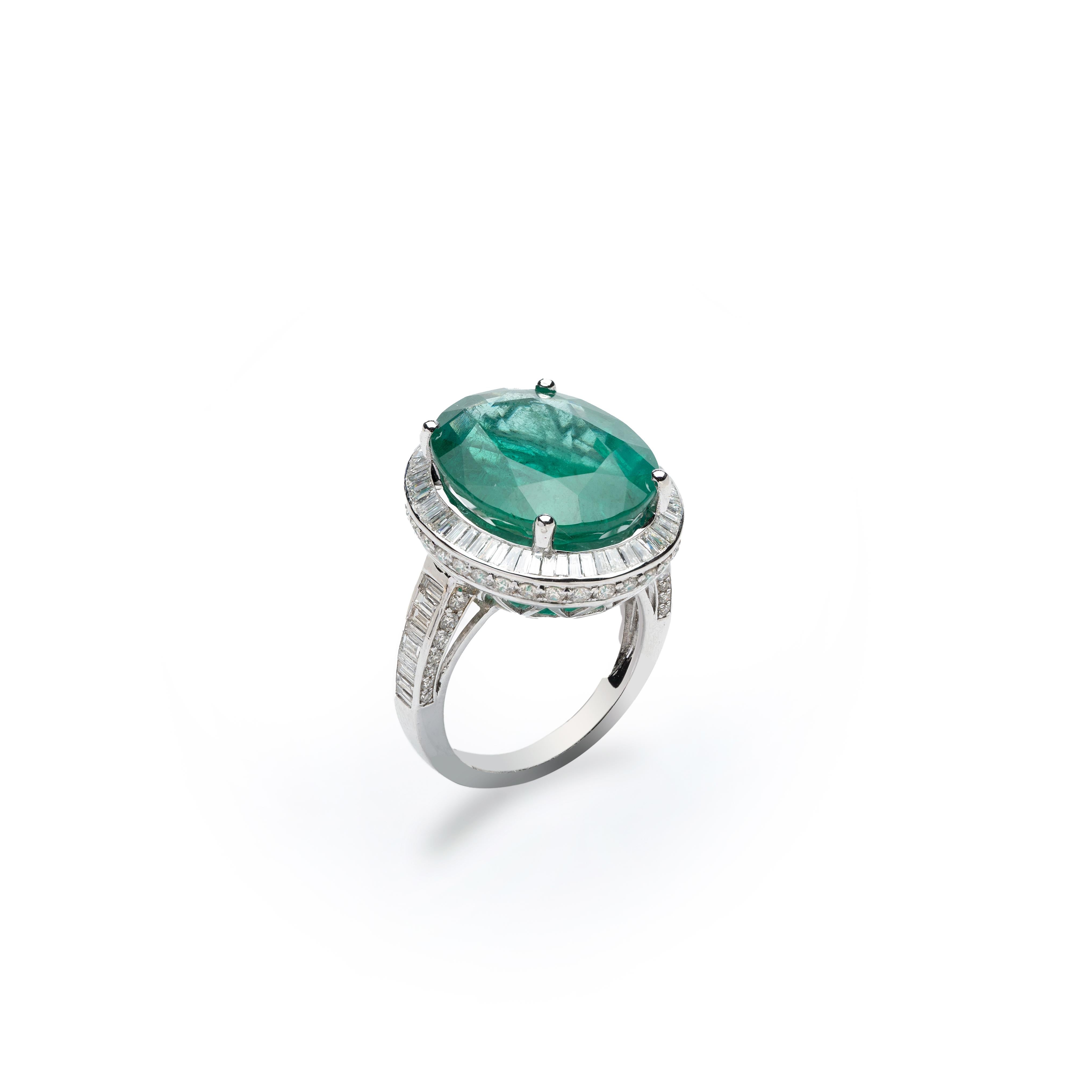 This is a natural Zambian Emerald ring with

 14.90 carats emerald

 2.15 cents diamonds

 6.60 gms gold ( 14k)


 The emeralds are very high quality and very good quality diamonds the clarity is vsi and G colour

This is a brand new piece


. Its