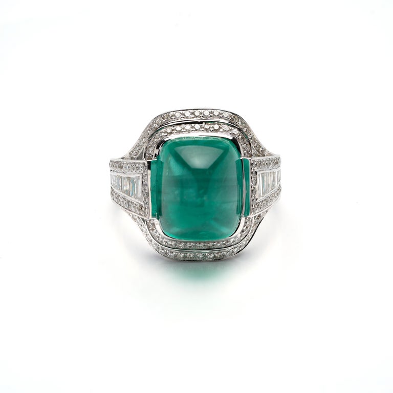 This is a natural Zambian Emerald ring with

 8.51 carats emerald

 1.05 carats diamonds

 6.77 gms gold ( 14k)


 The emeralds are very high quality and very good quality diamonds the clarity is vsi and G colour

This is a brand new piece


. Its