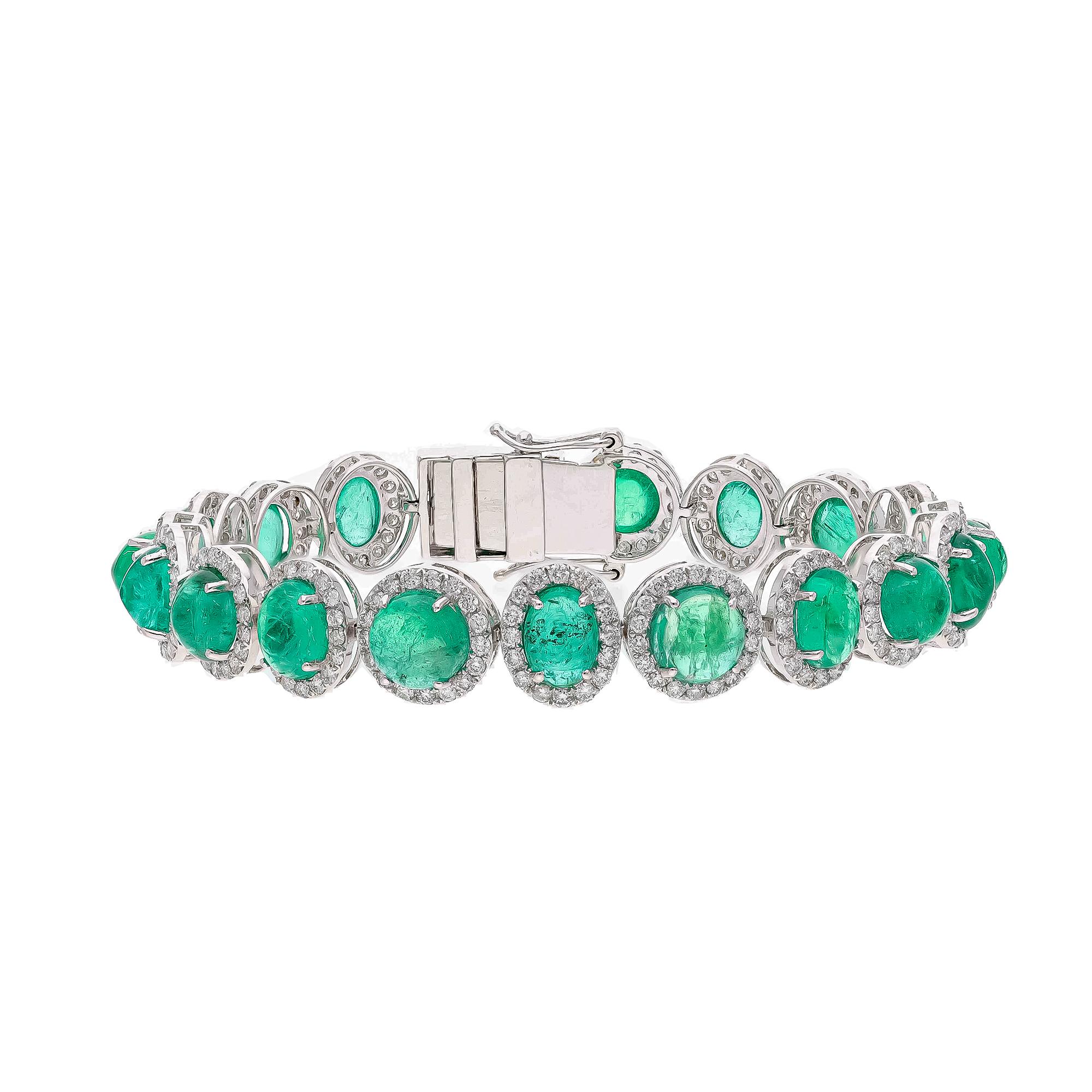 This is a stunning natural Zambian Emerald bracelet which has Emerald of very high quality and diamonds of very good quality . it has vsi clarity and G colour.

Emerald caboshans  : 20.93 cts
diamonds : 3.49 cts
gold : 15.246 gms

Its very hard to