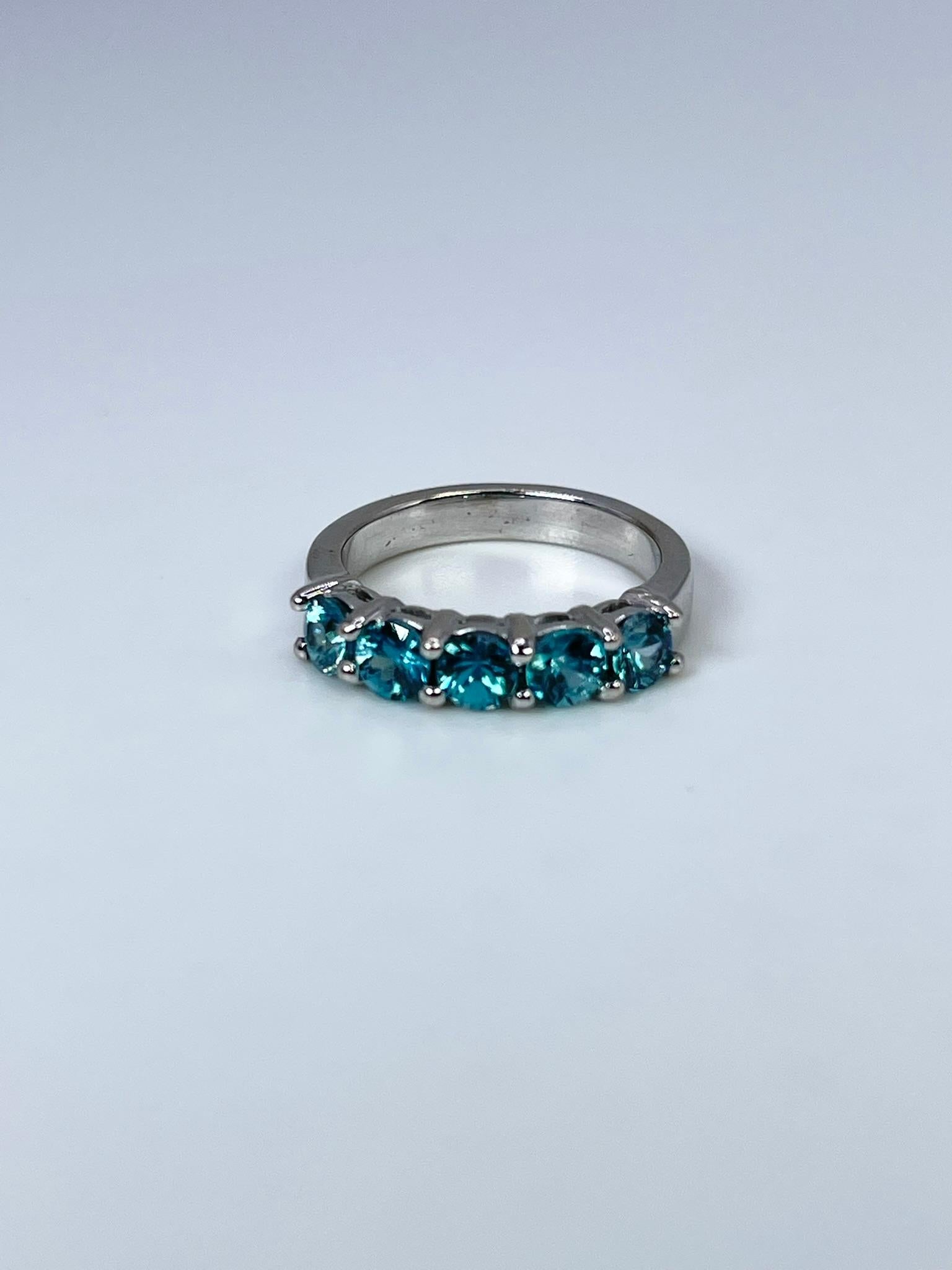 Stunning natural zircon in 14KT white gold. The blue zircon is a natural gemstone with stunning sparkle and saturated uniformed blue color.

GRAM WEIGHT: 4.35gr
GOLD: 14KT white gold
GEMSTONE: Natural Zircon 
CLARITY/COLOR: Slightly