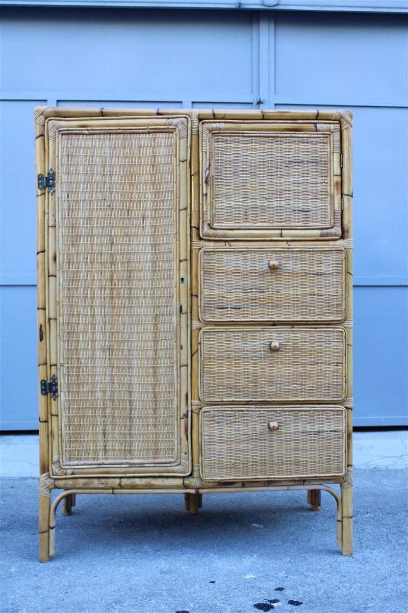 Naturalist cabinet wardrobe bamboo mid-century Italian design drawers and doors.

It is possible to use it as a sideboard, or as a wardrobe for a very special child's bedroom, there are three large drawers and two doors, in the large door it is