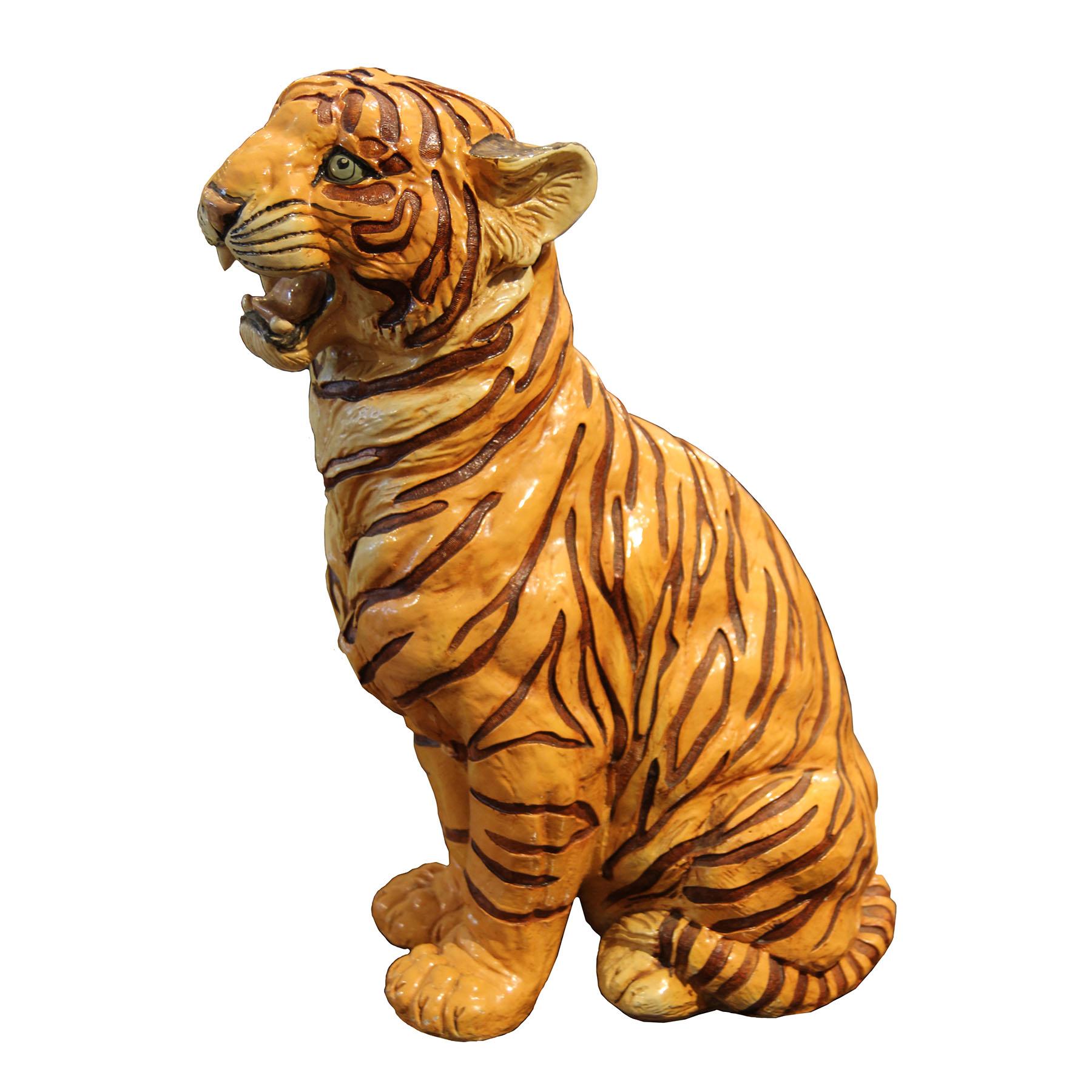 Majestic porcelain tiger sculpture. The stripes were individually sculpted and the tiger is hand painted with great detail.

  