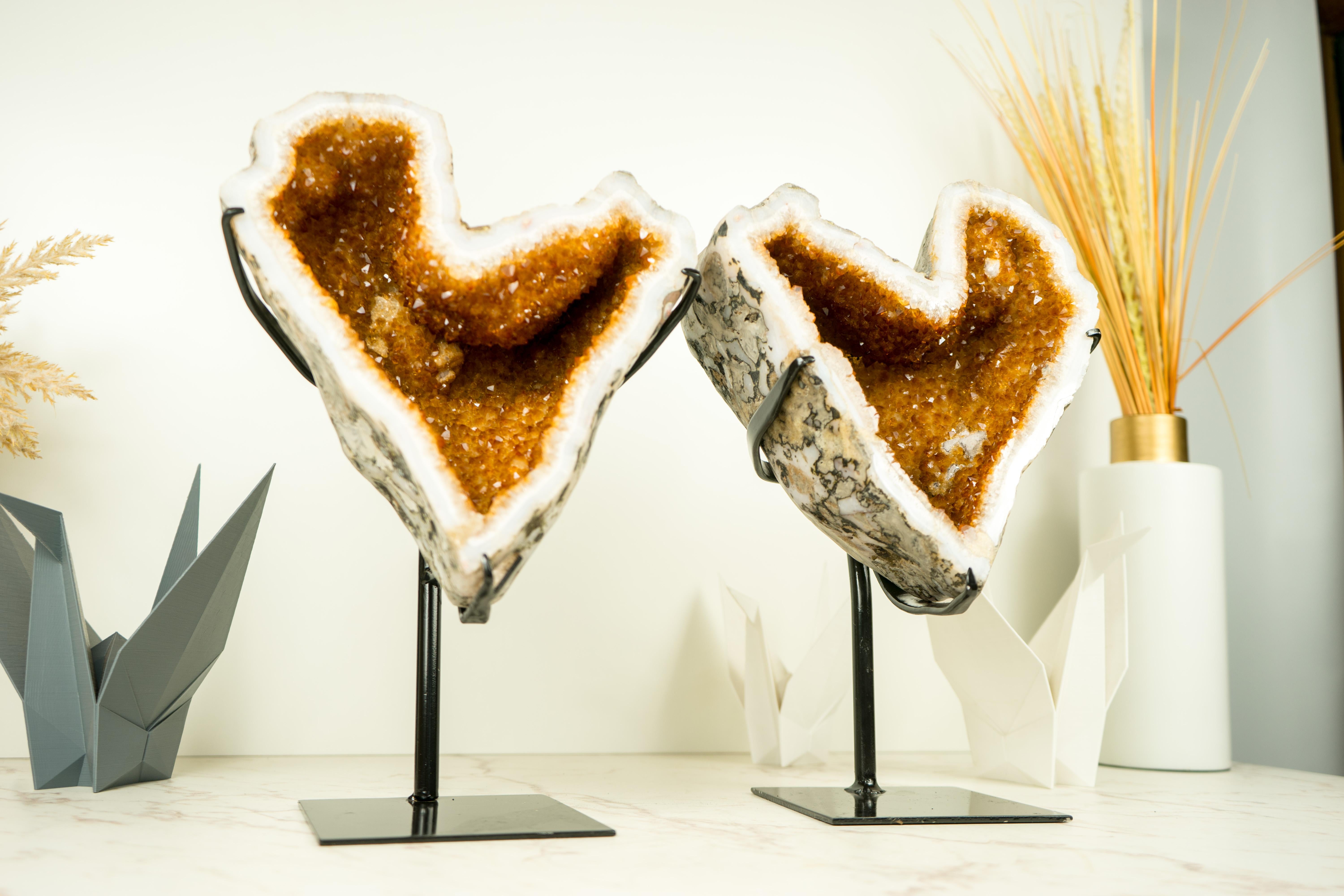 Naturally Shaped Citrine Heart Geodes with High-Grade Citrine Druzy on White Agate Matrix

▫️ Description

Bringing the rarest geode form, this gallery-grade geode is naturally formed in a heart shape and is characterized by its warm orange hue that