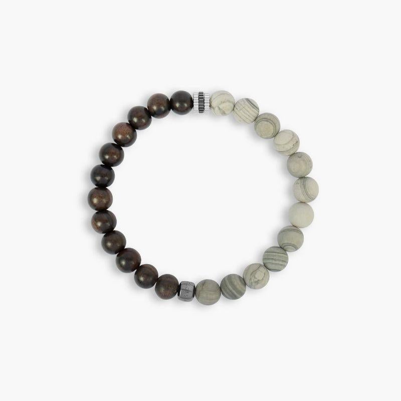 Pulsera Nature con madera de ébano y jaspe gris en plata rodiada, talla S

Inspirada en la naturaleza, nuestra nueva pulsera 