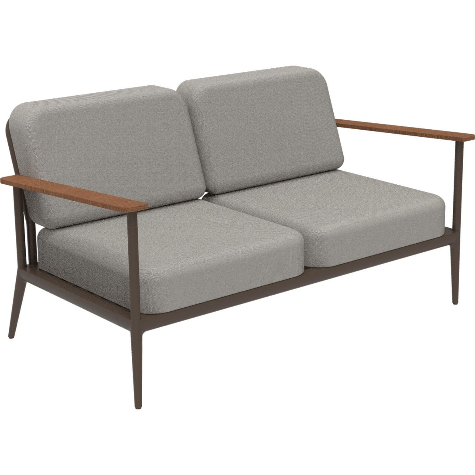 Nature bronze sofa by MOWEE
Dimensions: D85 x W151 x H81 cm (seat height 42 cm).
Material: aluminum, upholstery and Iroko Wood.
Weight: 32 kg.
Also available in different colors and finishes.

An unmistakable collection for its beauty and
