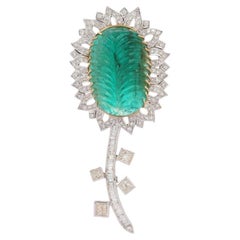 Broche fleur en or blanc 18 carats inspirée de la Nature, émeraude de Zambie et diamants