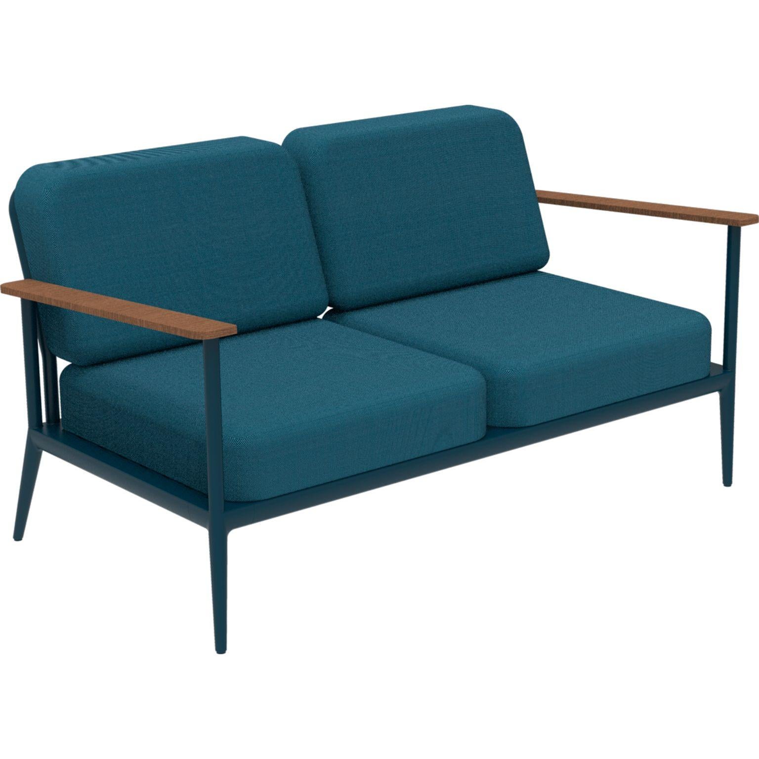 Nature Navy sofa by MOWEE
Dimensions: D85 x W151 x H81 cm (seat height 42 cm).
Material: Aluminum, upholstery and Iroko Wood.
Weight: 32 kg.
Also available in different colors and finishes. 

An unmistakable collection for its beauty and