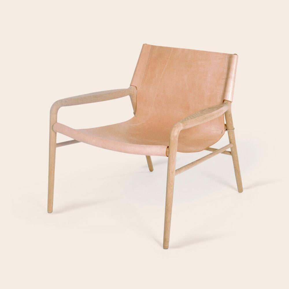 Nature Rama oak chair by OxDenmarq
Dimensions: D 72 x W 68 x H 70 cm
Materials: Leather, Wood
Also Available: Different colors available

OX DENMARQ is a Danish design brand aspiring to make beautiful handmade furniture, accessories and