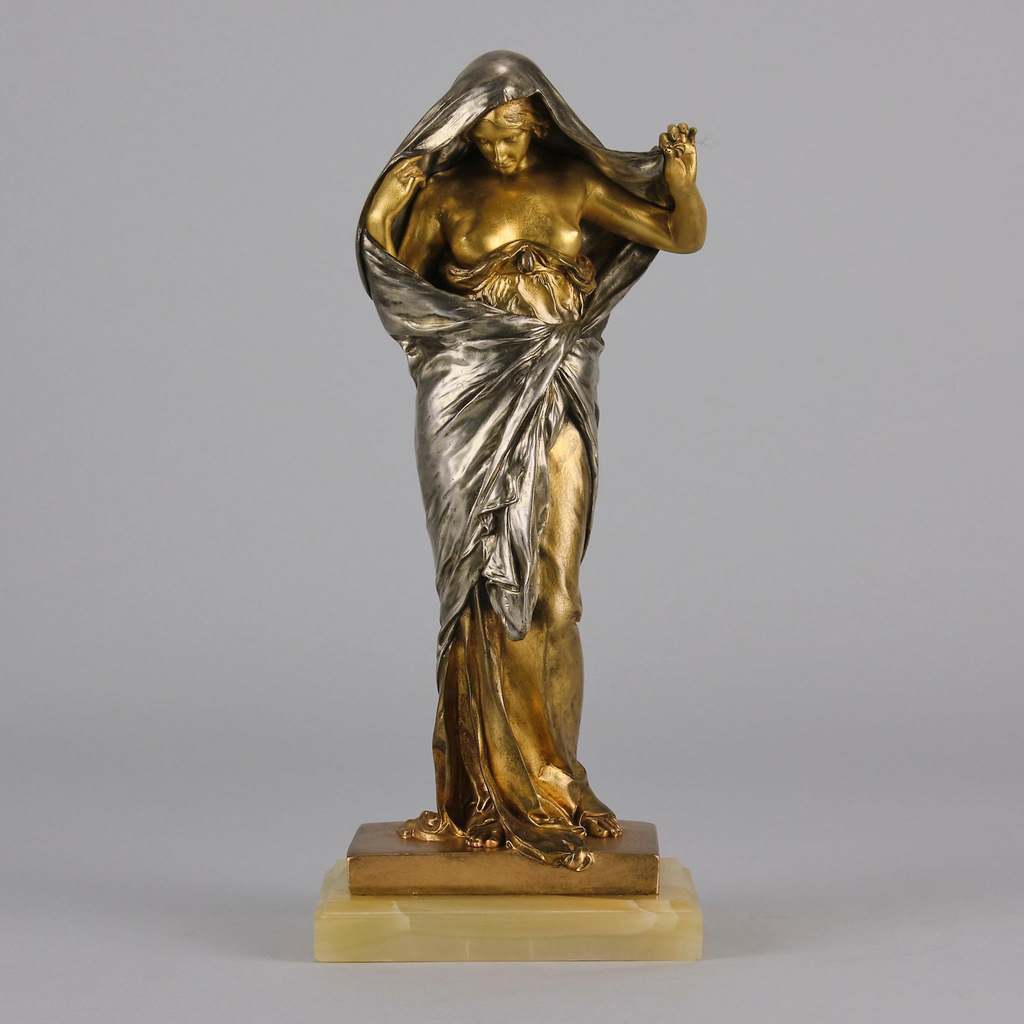 Wonderful late 19th Century French bronze figure of a seductively draped female figure representing, in allegorical form, Nature revealing her secrets to Science, a fitting theme for the late nineteenth century. The interest in nature literally