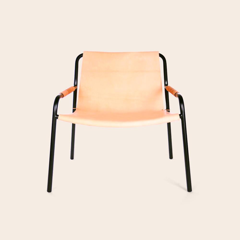 Nature September chair by OxDenmarq
Dimensions: D 71 x W 71 x H 70 cm
Materials: Bull Leather, Black Powder Coated Steel
Also Available: Different leather colors available

OX DENMARQ is a Danish design brand aspiring to make beautiful handmade