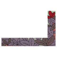 Nature‑inspired L‑shaped border rug with layered leaves. Hand‑knotted in Nepal.