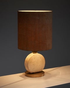 Naturel table lamp travertine base cork shade in the style of Studio CE.