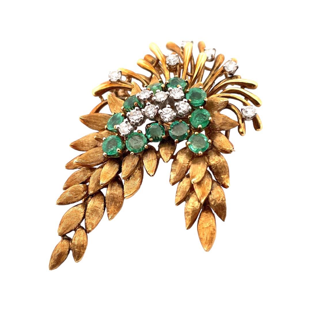 Nature's Elegance 18K Yellow Gold Brooch with emeralds and diamonds

Embrace the beauty of the natural world with our 