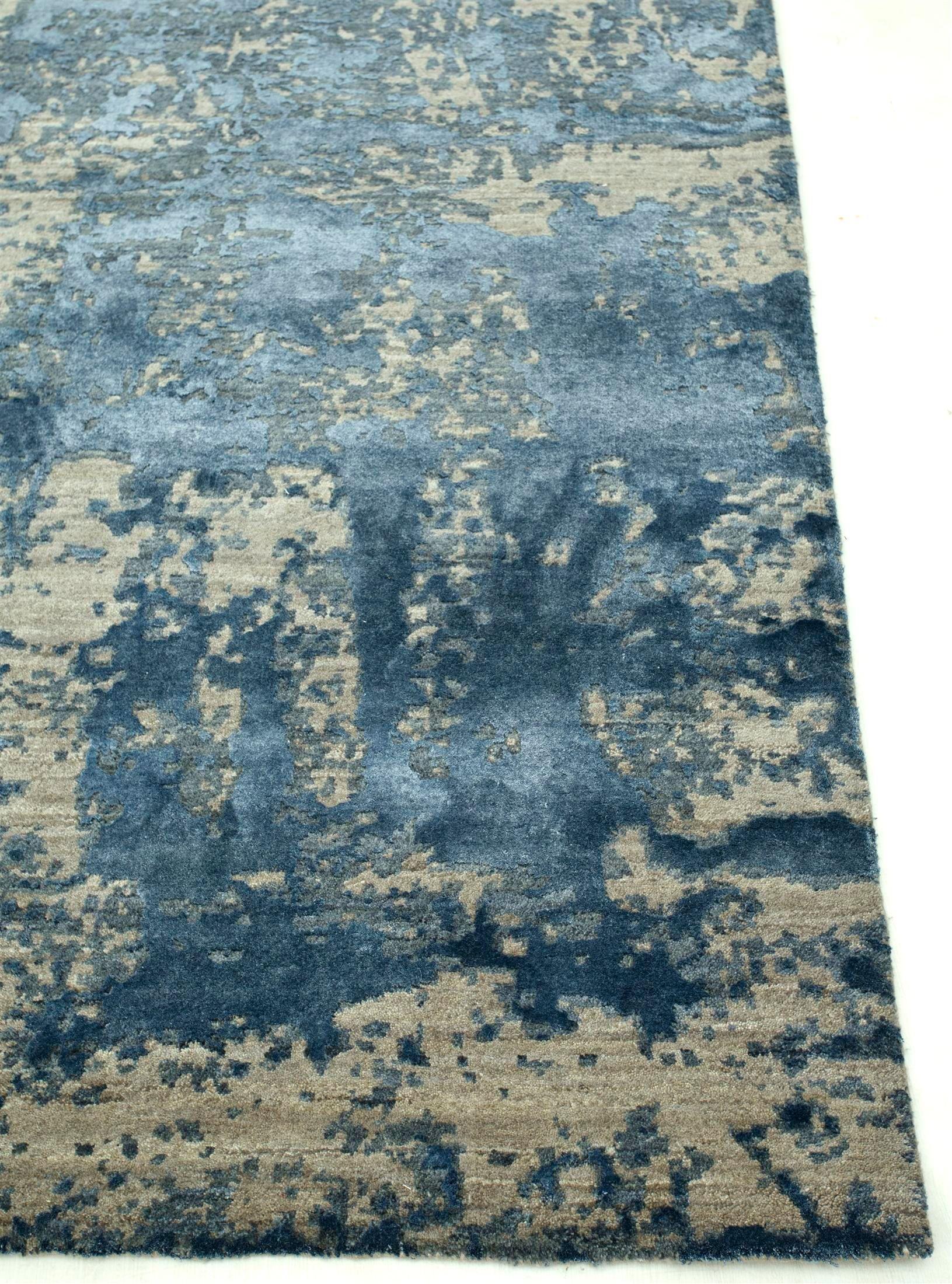 Introducing the Hand Knotted Rug, a contemporary masterpiece that artfully embraces the allure of imperfection. This unique creation is a visual exploration of misprints and nature's intervention in mechanical duplication, resulting in a captivating