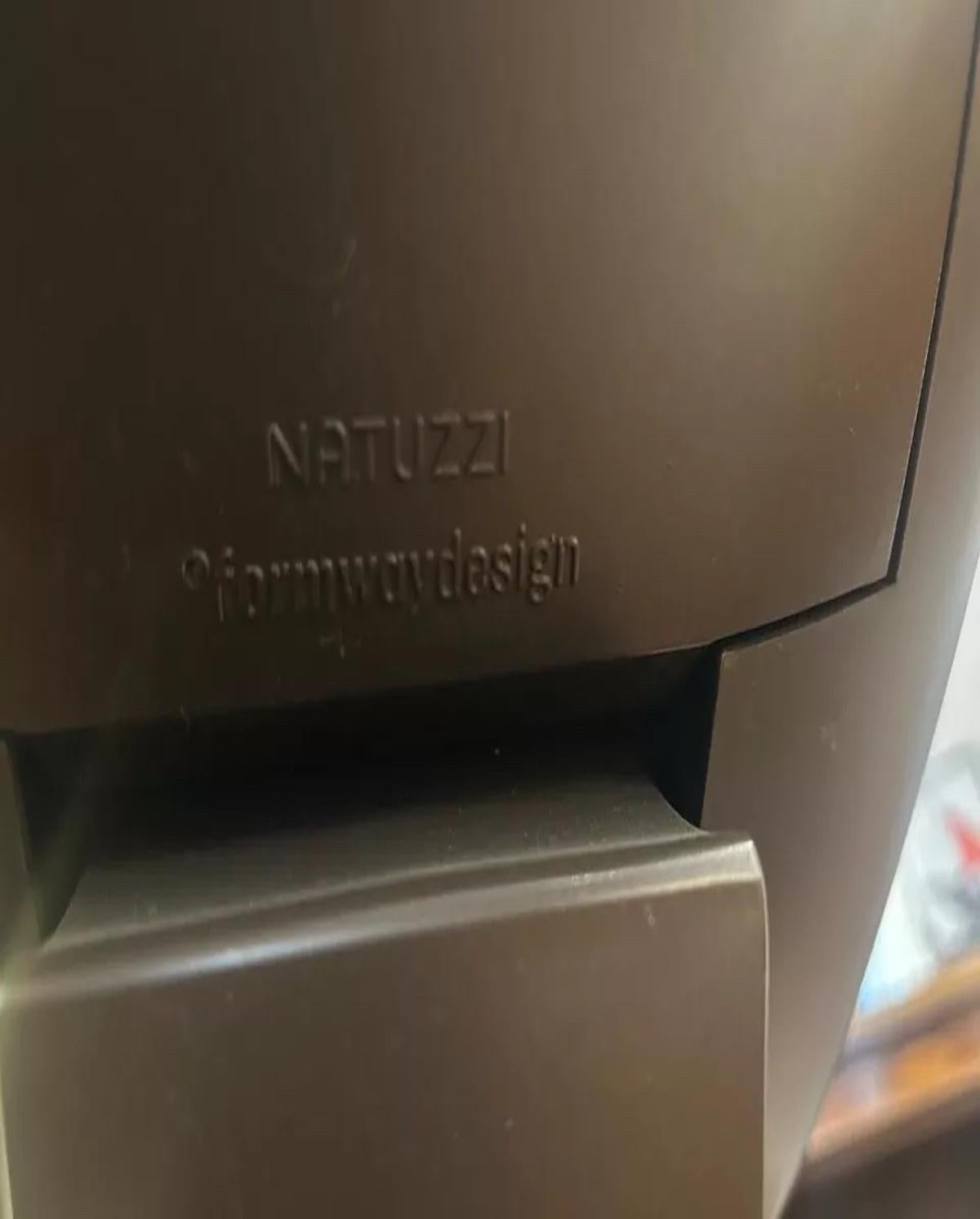 Natuzzi Brown Leather Reclining Chair With Footstool 1