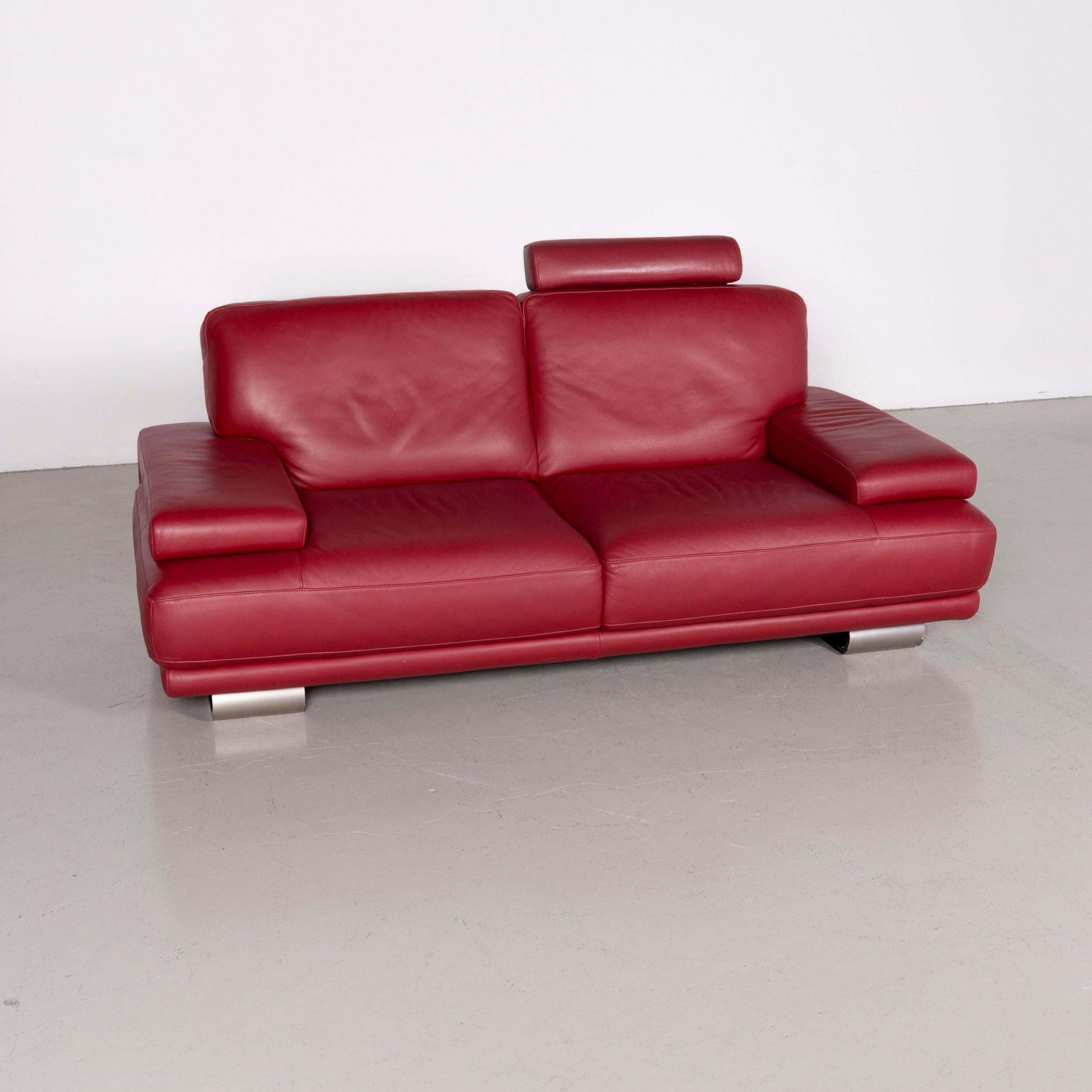 We bring to you a Natuzzi designer leather sofa red three-seat couch.