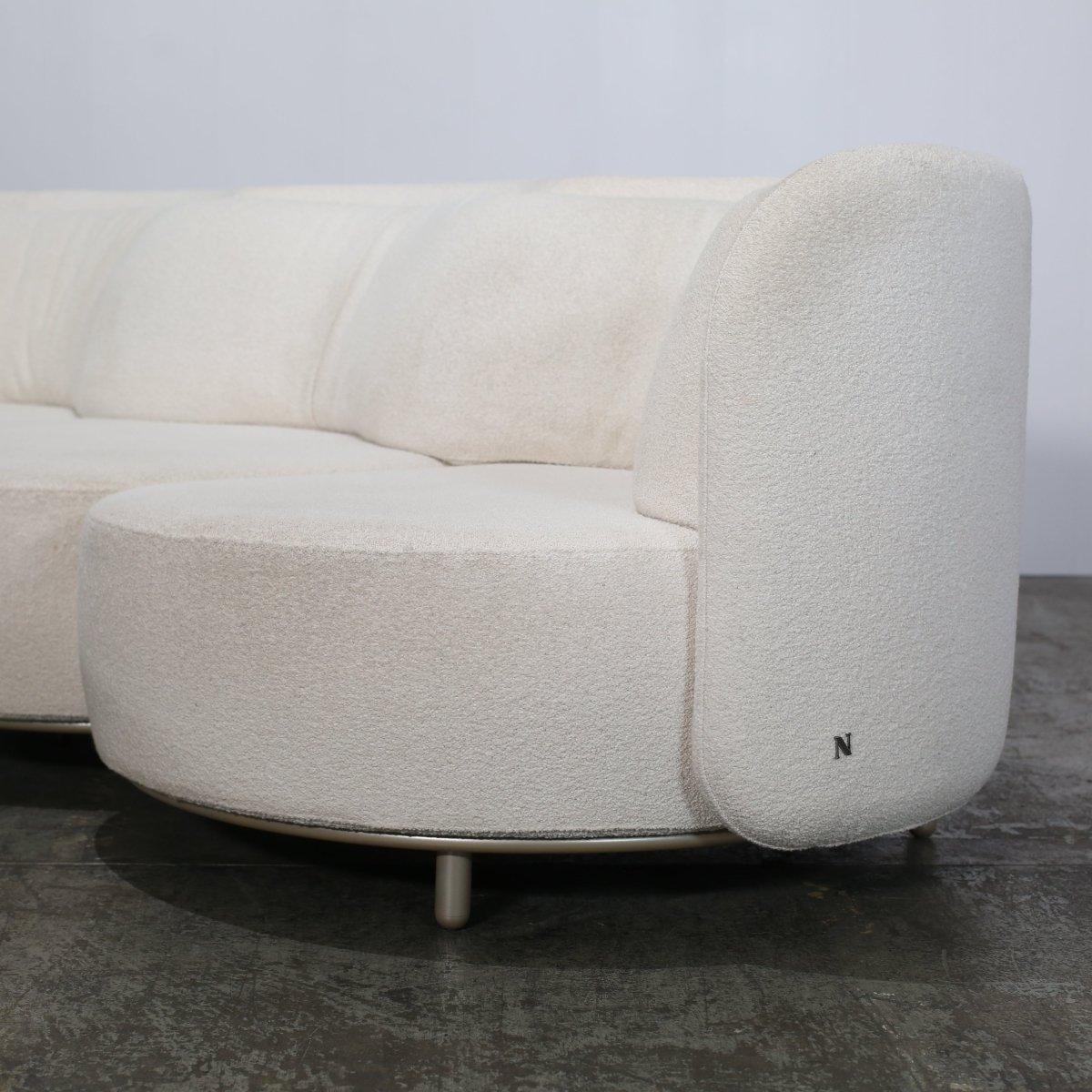 Introducing the ultimate in luxury and comfort - the Four Seater Wave Sofa & Footstool by Natuzzi. Crafted with high quality materials and attention to detail, this unique piece will elevate any living space. The sleek and modern design features a