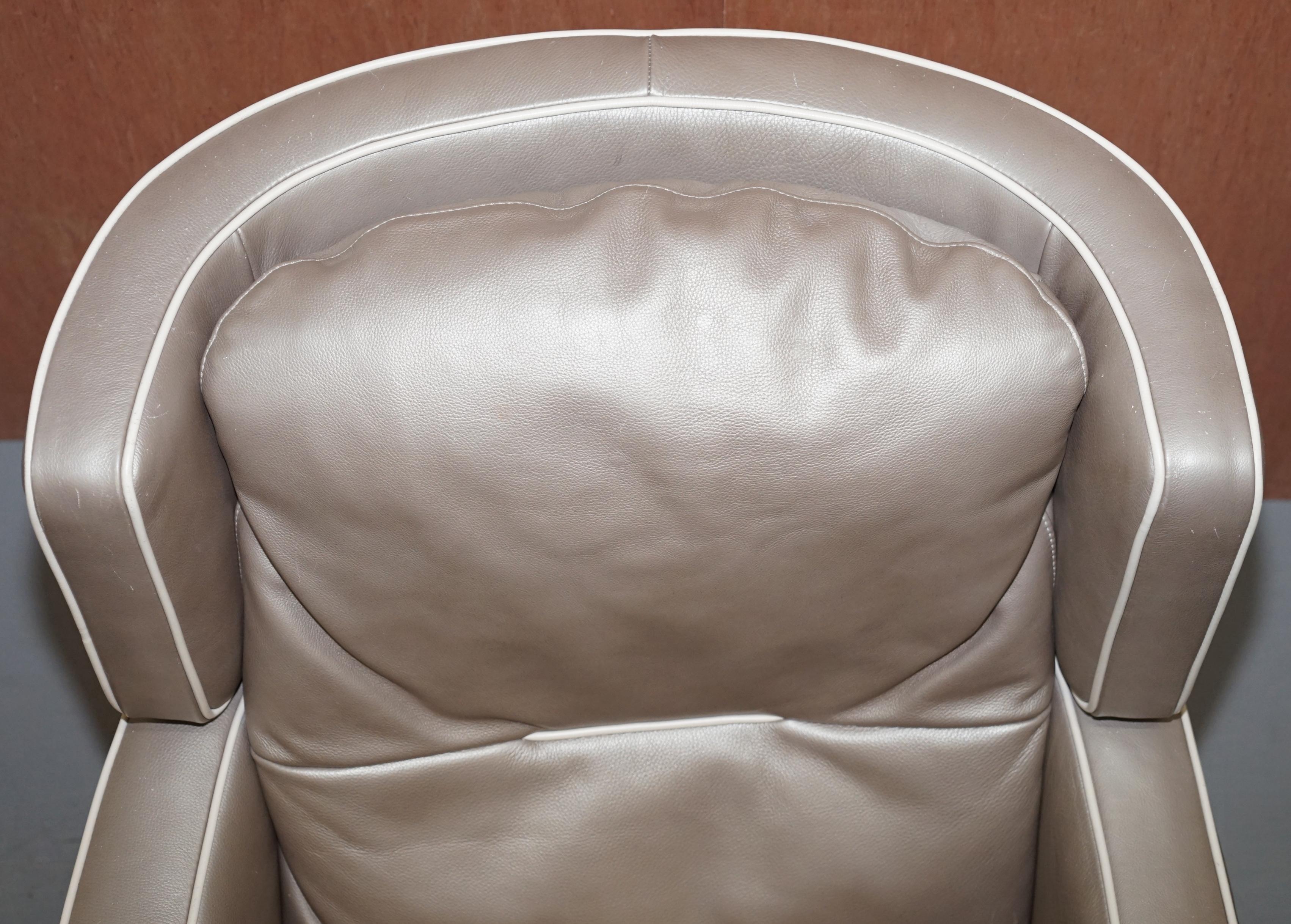 Pelle Natuzzi Italia Amadeus Platinum Grey Poltrona e poggiapiedi in pelle Made in Italy