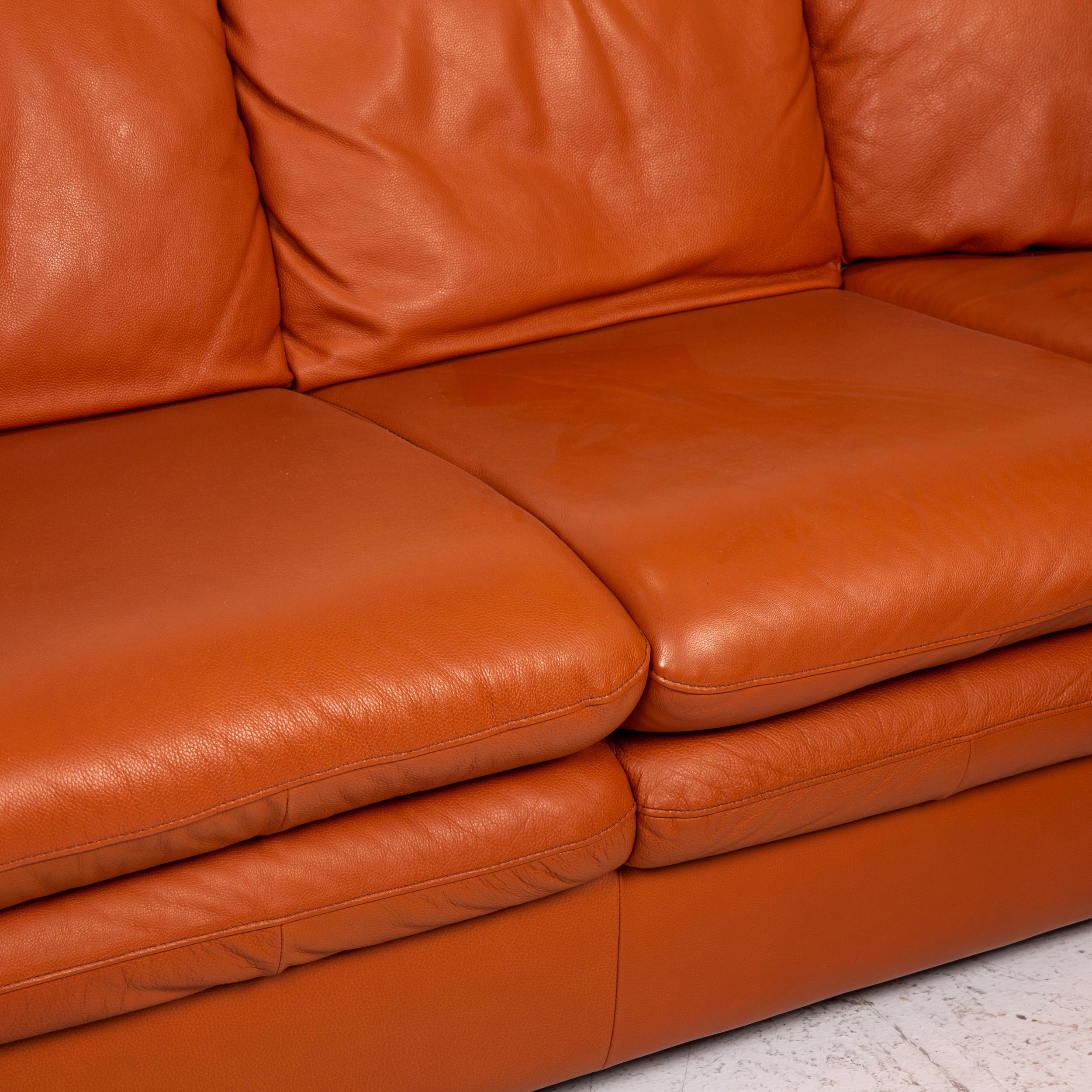 natuzzi orange leather sofa