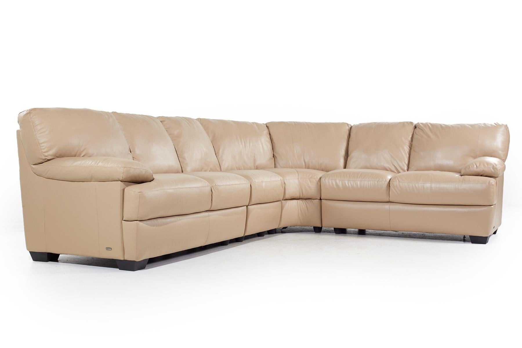 Natuzzi Leather Sectional Sofa

This sofa measures: 120 wide x 95 deep x 37 inches high, with a seat height of 21 and arm height of 25 inches

We take our photos in a controlled lighting studio to show as much detail as possible. We do not Photoshop