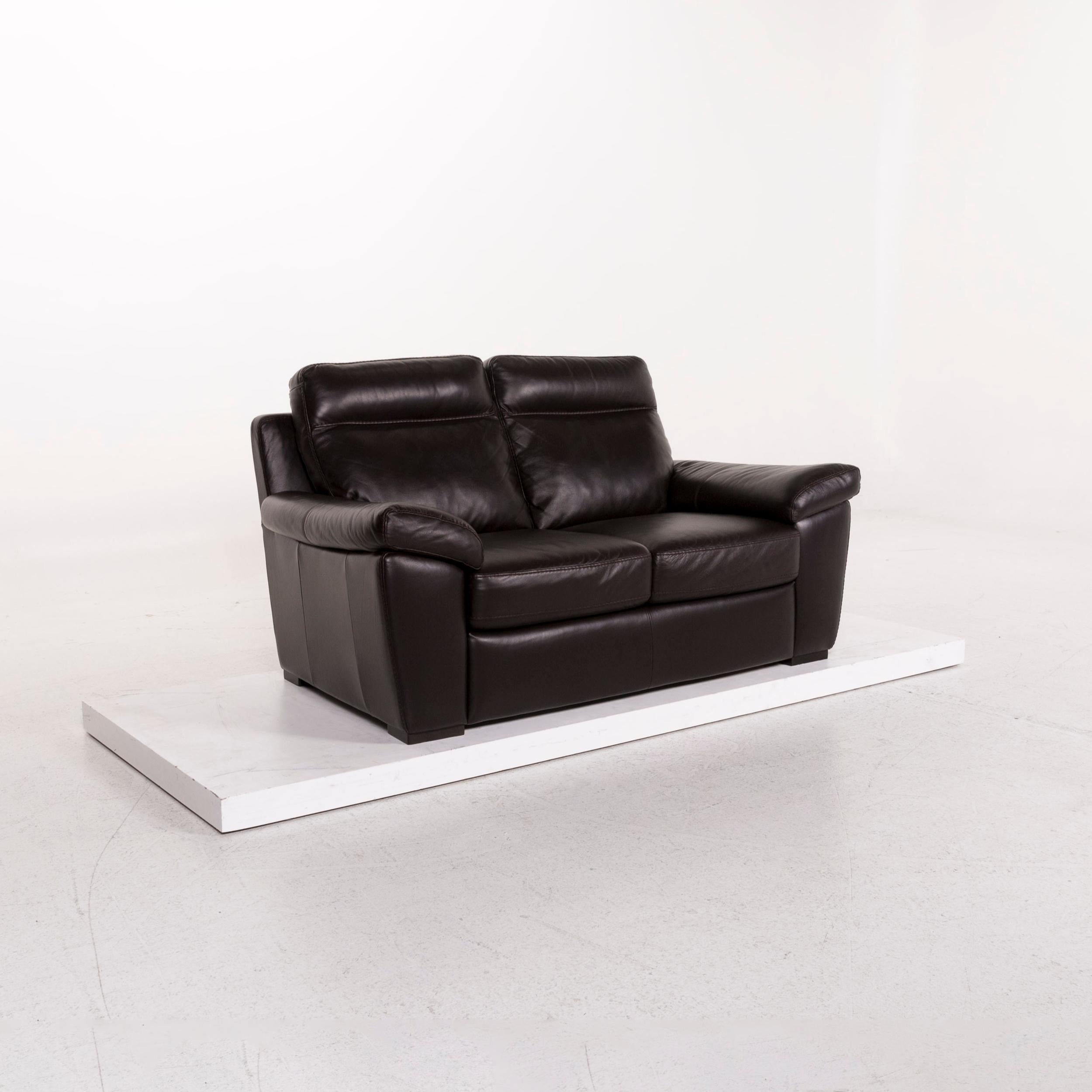We bring to you a Natuzzi leather sofa brown dark brown two-seat couch.

 

 Product measurements in centimeters:
 

Depth 97
Width 162
Height 90
Seat-height 42
Rest-height 56
Seat-depth 54
Seat-width 102
Back-height 50.