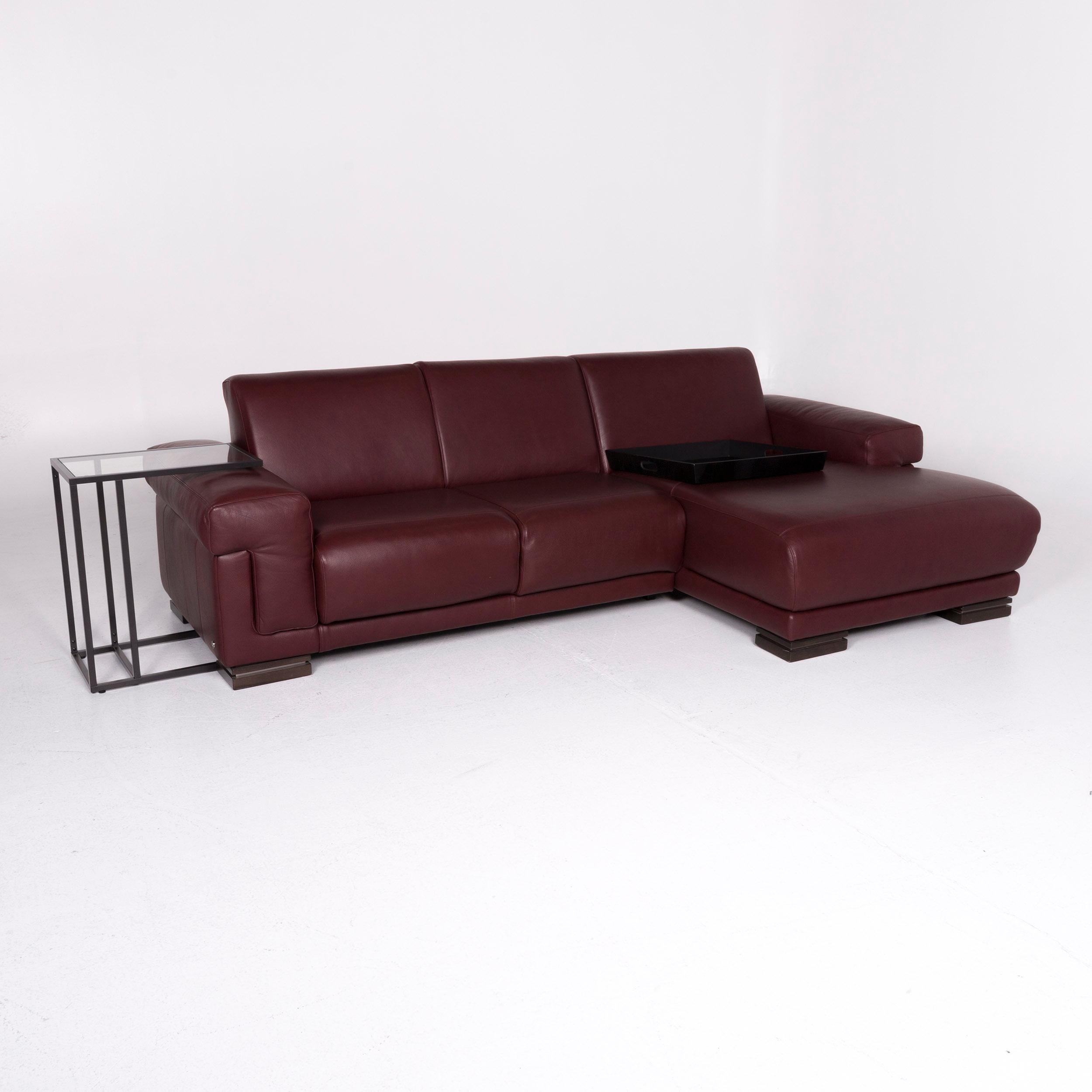 We bring to you a Natuzzi leather sofa red corner sofa including side table.
 
 Product measurements in centimeters:
 
Depth 98
Width 280
Height 85
Seat-height 48
Rest-height 62
Seat-depth 60
Seat-width 215
Back-height 41.
 