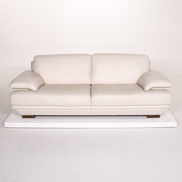 Natuzzi Leather Sofa Set Cream 1 ThreeSeat 1 Stool For Sale at 1stDibs