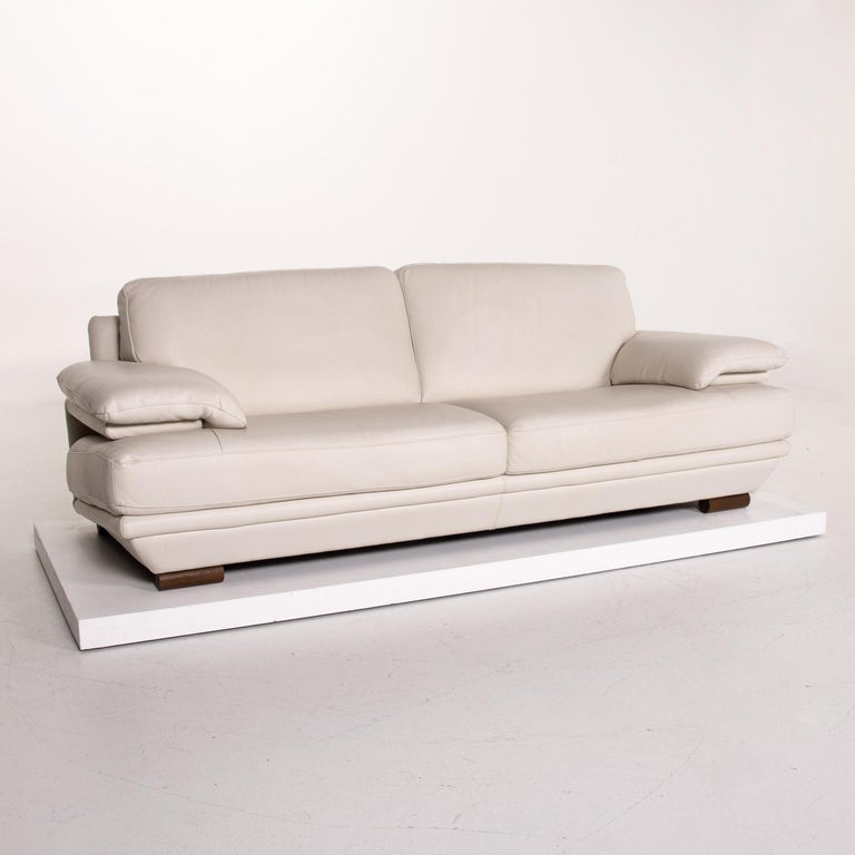 Natuzzi Leather Sofa Set Cream 1 ThreeSeat 1 Stool For Sale at 1stDibs