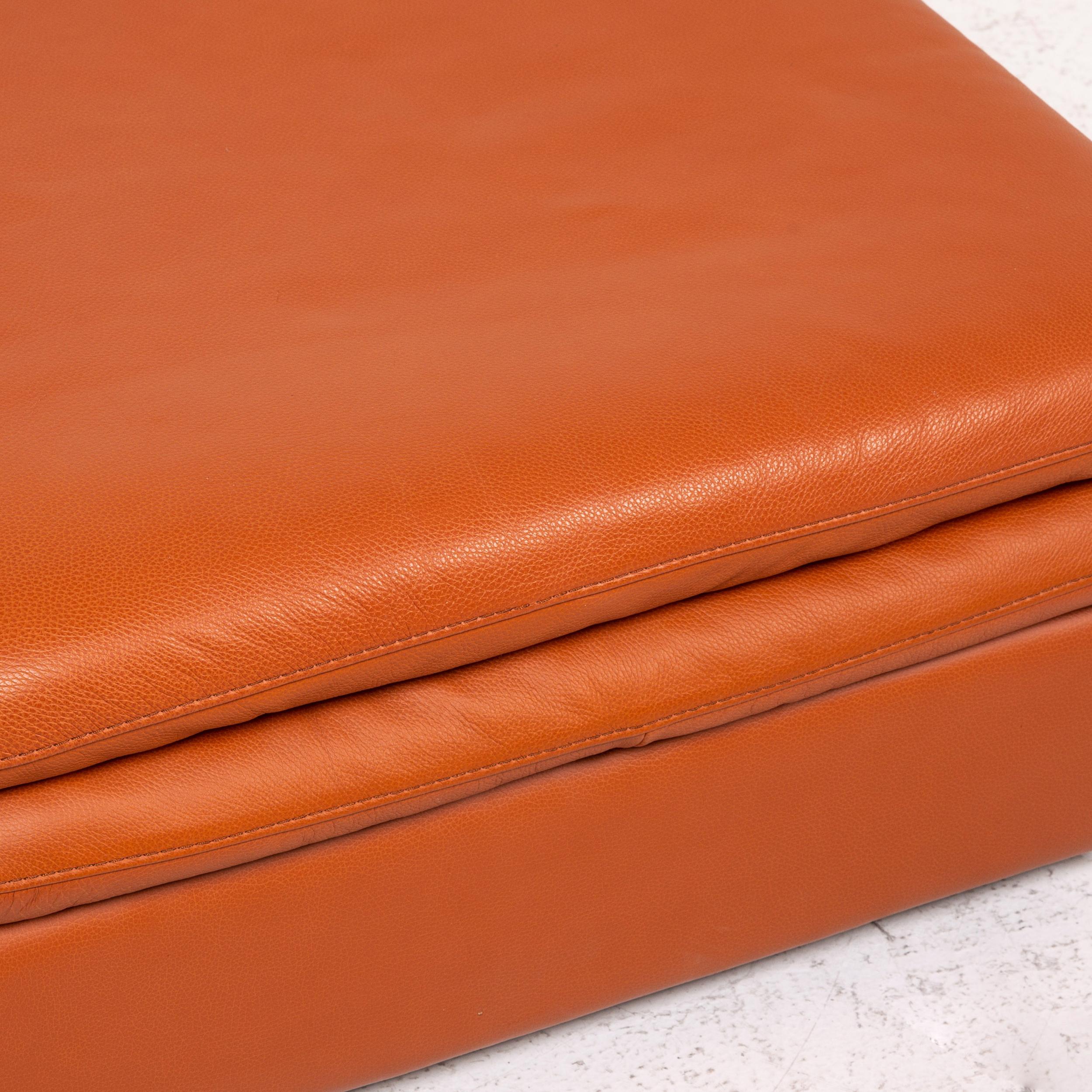 orange leather ottoman