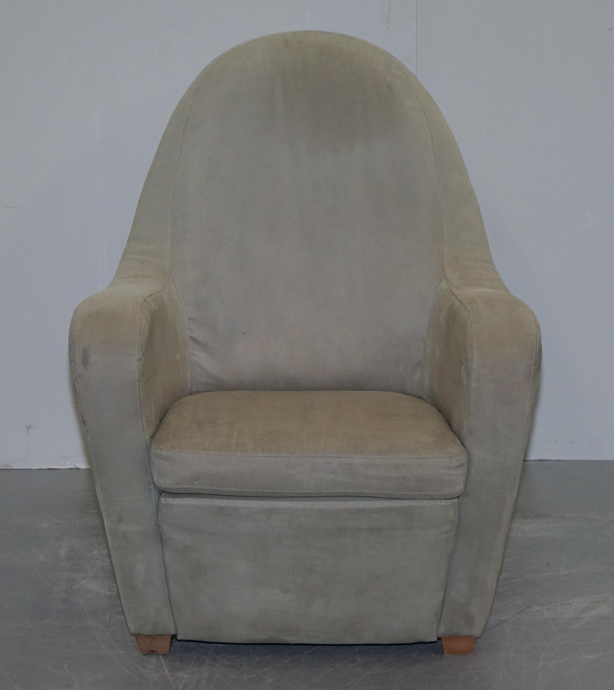 We are delighted to offer for sale this rather expensive hand made in Italy Natuzzi curved back armchair upholstered in grey suede

This chair need has been professionally upholstery cleaned, it is now fresh and ready to go. In the photos there