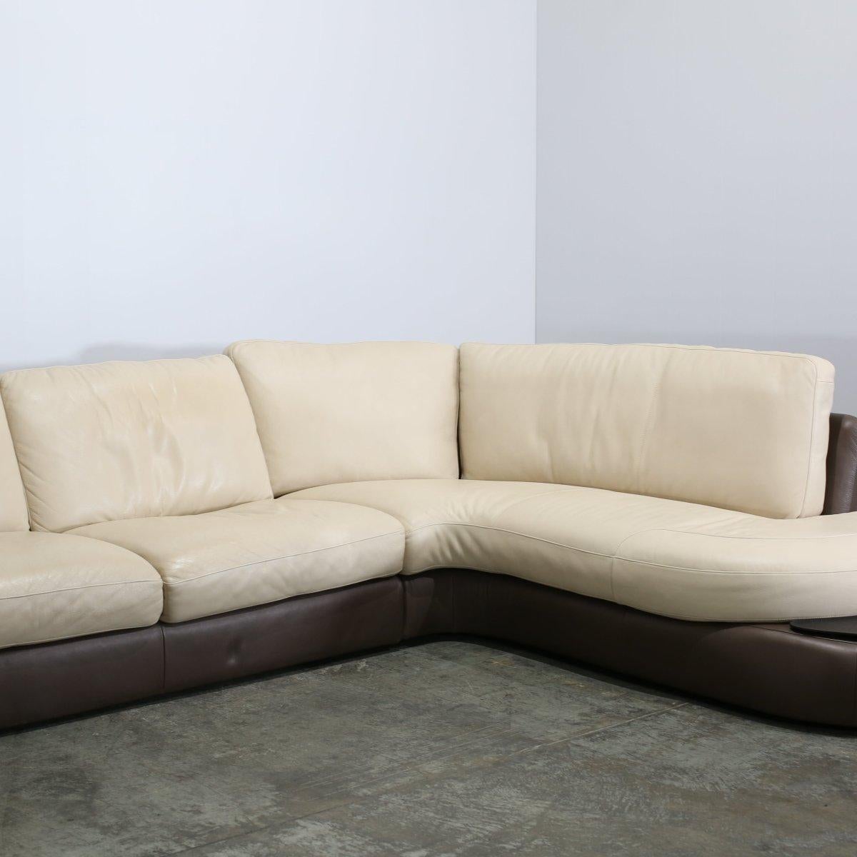 Introducing the epitome of luxury and comfort - the Odessa Sofa by Natuzzi. This stunning piece boasts a sleek and modern design, perfect for any contemporary living space. Crafted with high quality materials, including top-grain leather and a