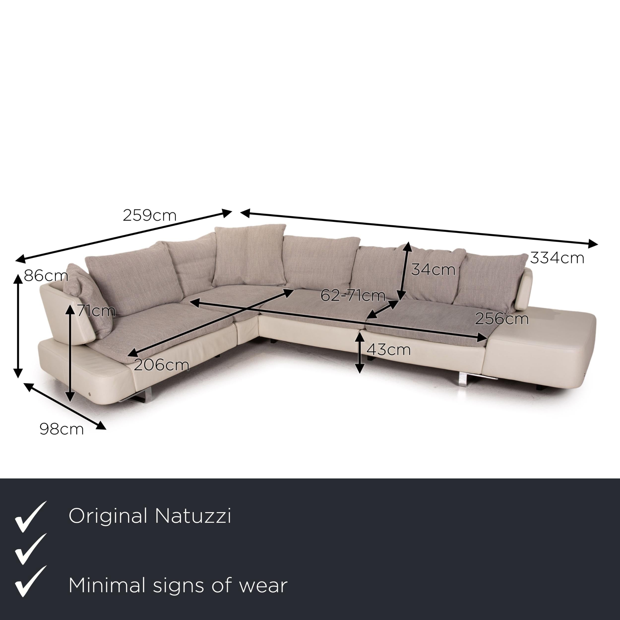 We present to you a Natuzzi Opus leather fabric corner sofa gray cream sofa couch.

 

 Product measurements in centimeters:
 

 depth: 98
 width: 259
 height: 86
 seat height: 43
 rest height: 71
 seat depth: 62
 seat width: 206
 back