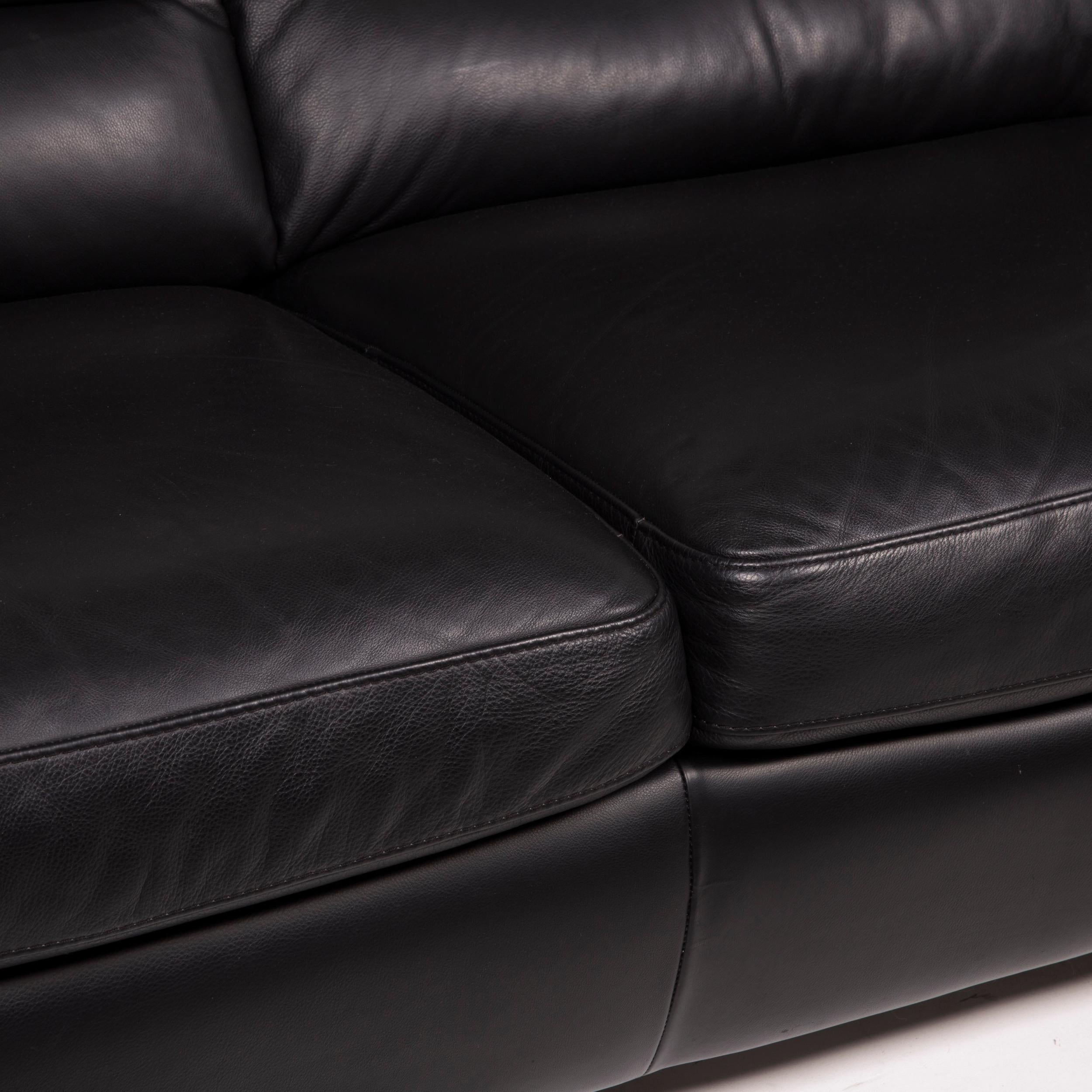 two seater black leather sofa
