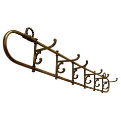 Nautical Brass Folding Coat Hook Rack from a Yacht