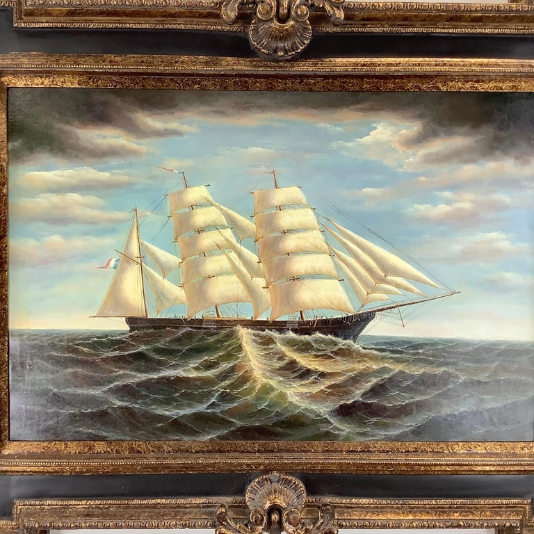 This impressive large painting on canvas depicts a clipper ship on choppy seas, with a wonderful mixed palette including dark clouds and blue skies, the ship appears to be flying a French flag. The ornate two tone frame features gilt applied detail