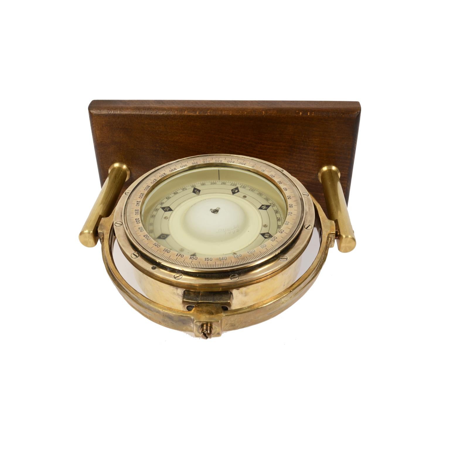 British Nautical Compass of Brass and Glass Made in the Early 1900s on a Walnut Board