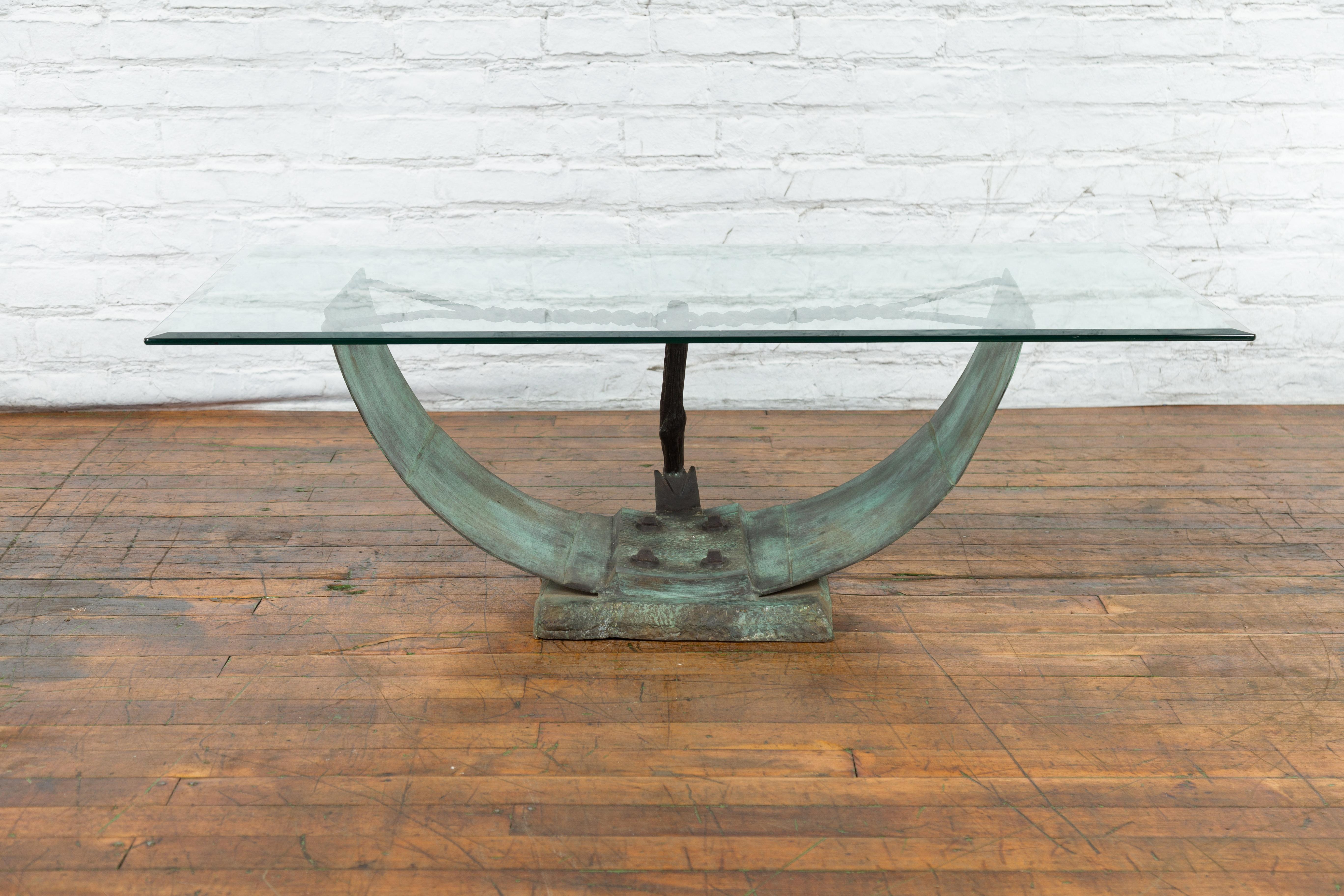 An Egyptian inspired contemporary nautical bronze coffee table base with rope design and verde bronze patina. Created with the traditional technique of the lost-wax (à la cire perdue) which allows for a great precision in the details, this nautical